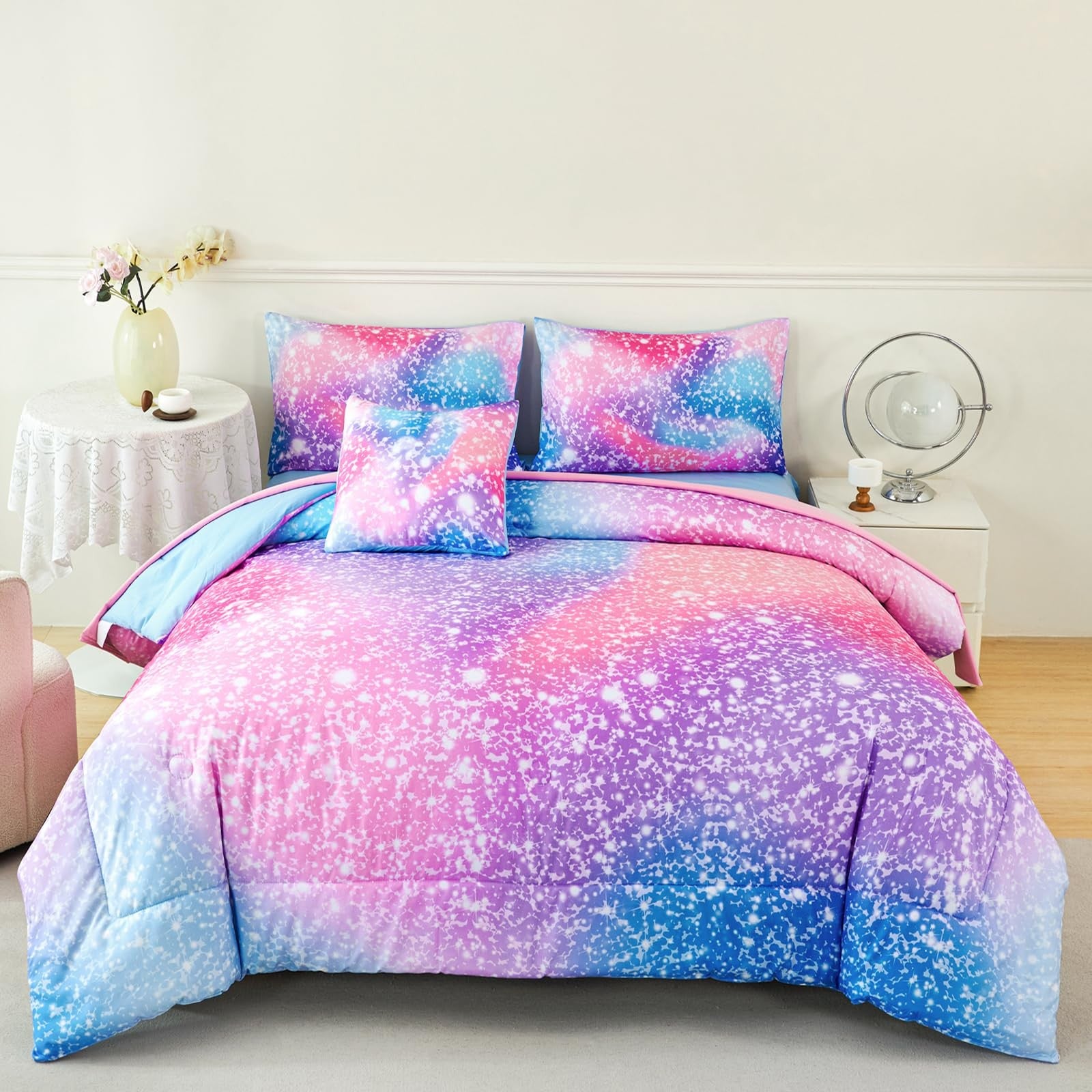Colorful rainbow twin-sized girls bedding set by RYNGHIPY with a comforter and matching pillowcases for kids.