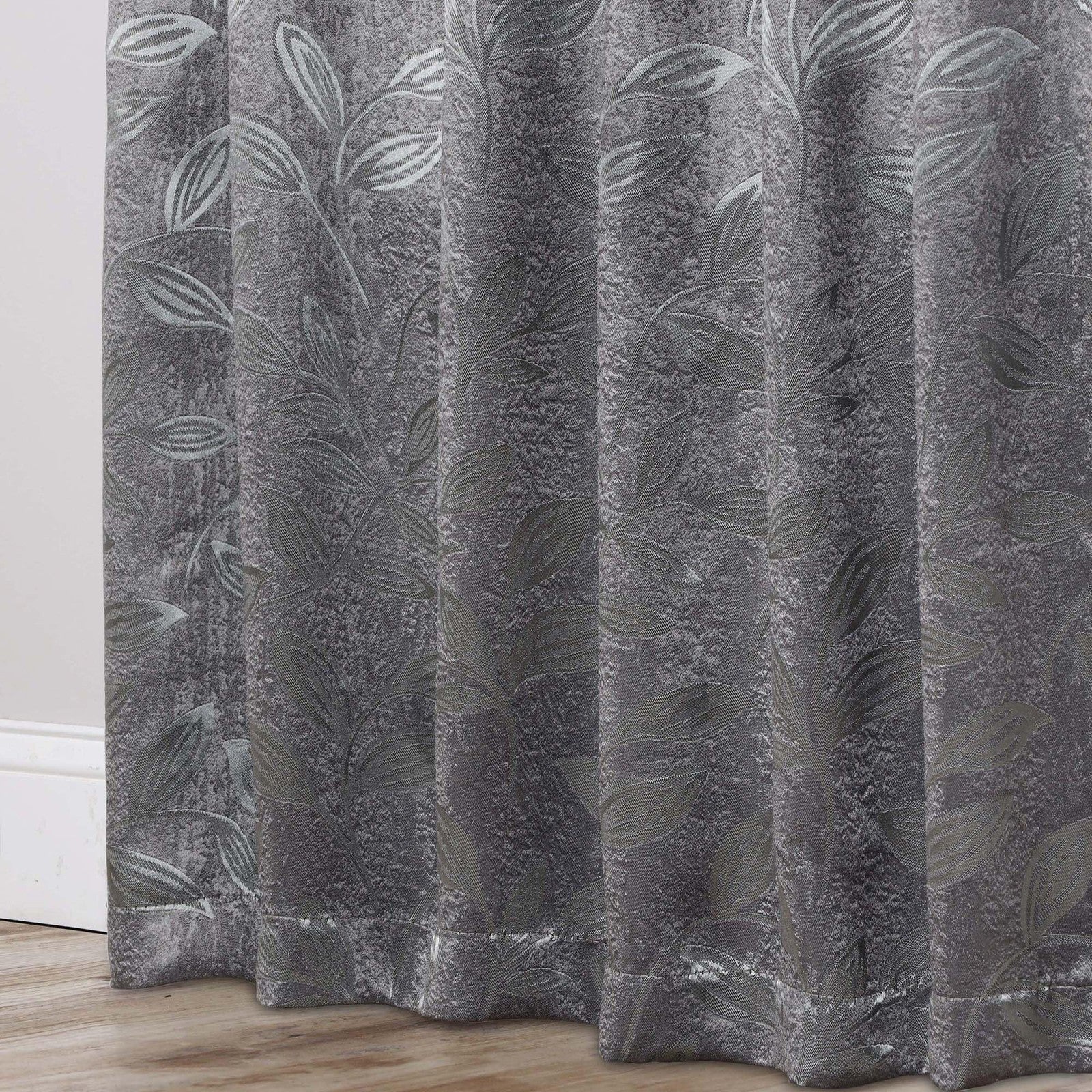 Superior Blackout Curtains in black fabric, room darkening drapes hanging in a bedroom window, ideal for bedrooms and living rooms.