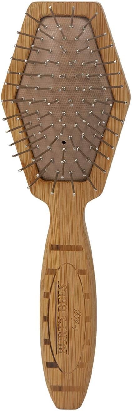 Burt's Bees for Pets double-sided pin and hemp bristle dog brush showing wooden handle and brush sides for grooming.