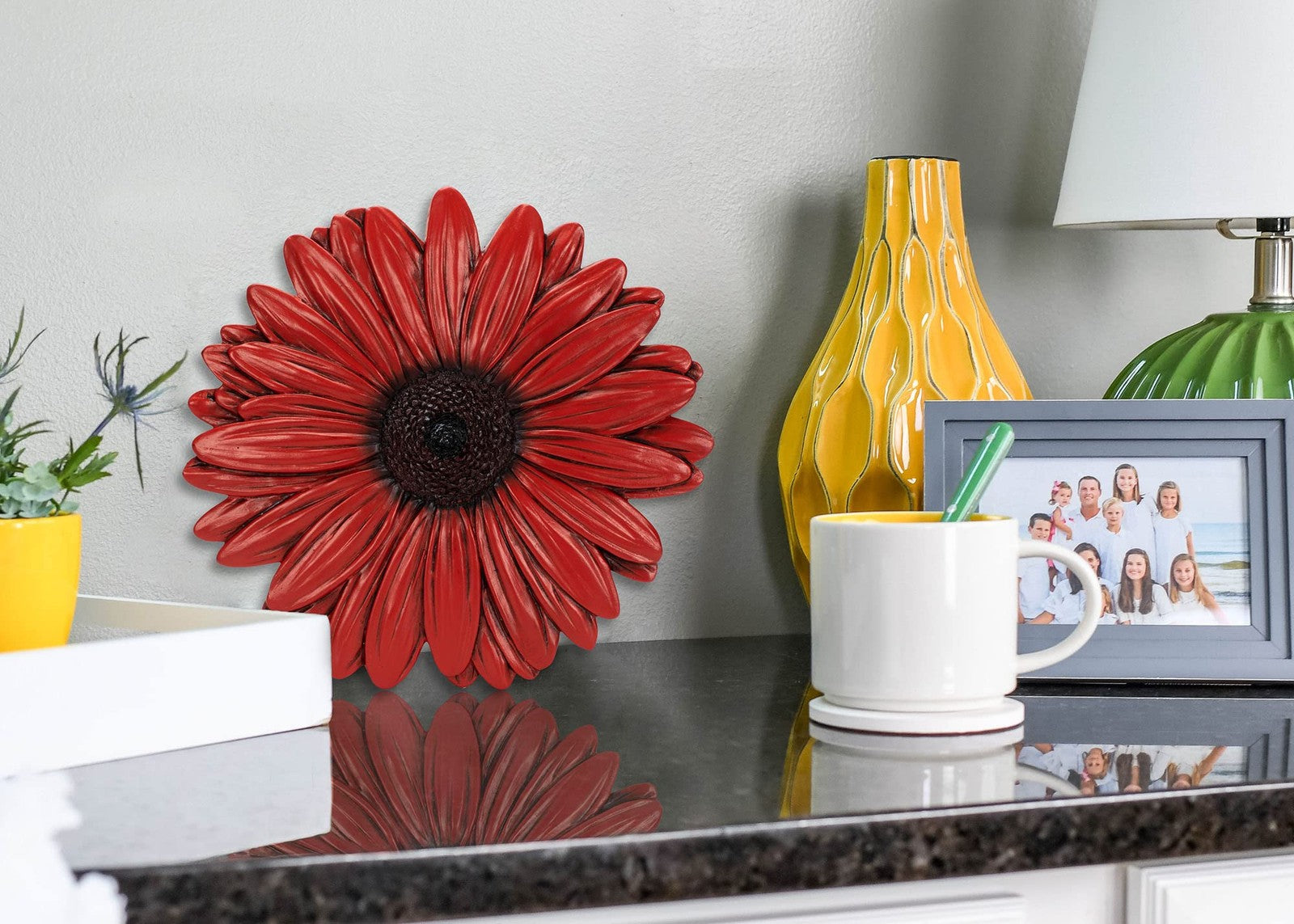 Sunflower-shaped Nat And Jules 12-inch dimensional indoor outdoor decorative light, bright yellow with detailed petal design.