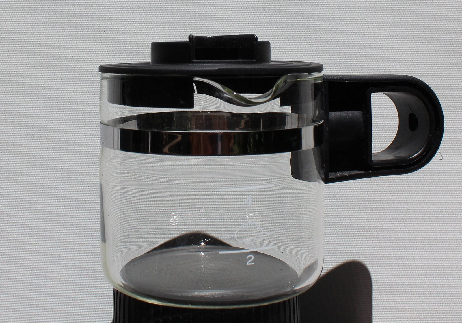 Melitta MEX1B espresso and cappuccino machine with stainless steel finish and compact design for home brewing.