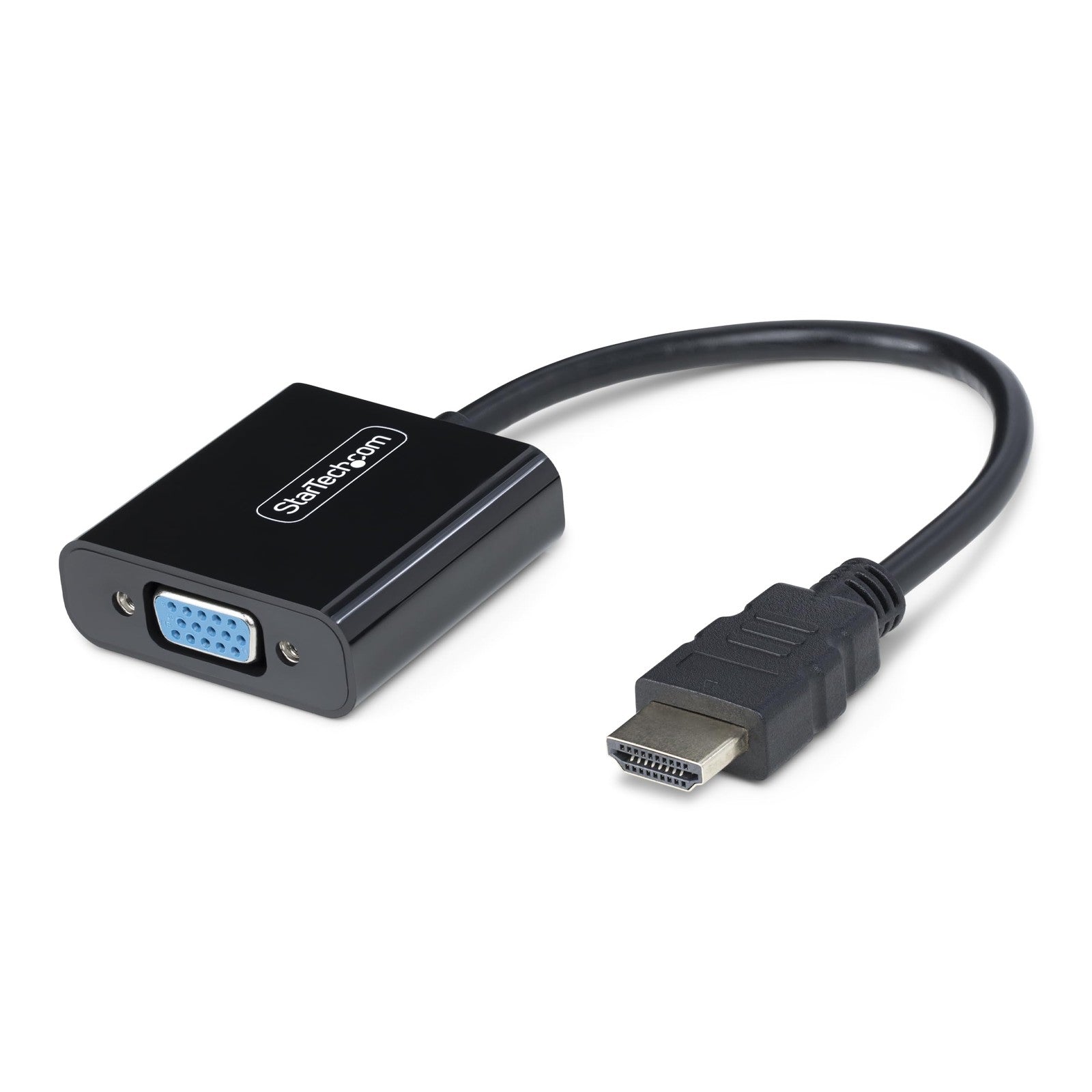 StarTech HDMI to VGA adapter connected to a laptop, active video converter for seamless HDMI to VGA display conversion.
