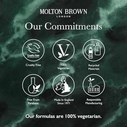 Molton Brown Reviving Rosemary Conditioner bottle, 10 fl oz, with rosemary and botanical ingredients visible on the label.