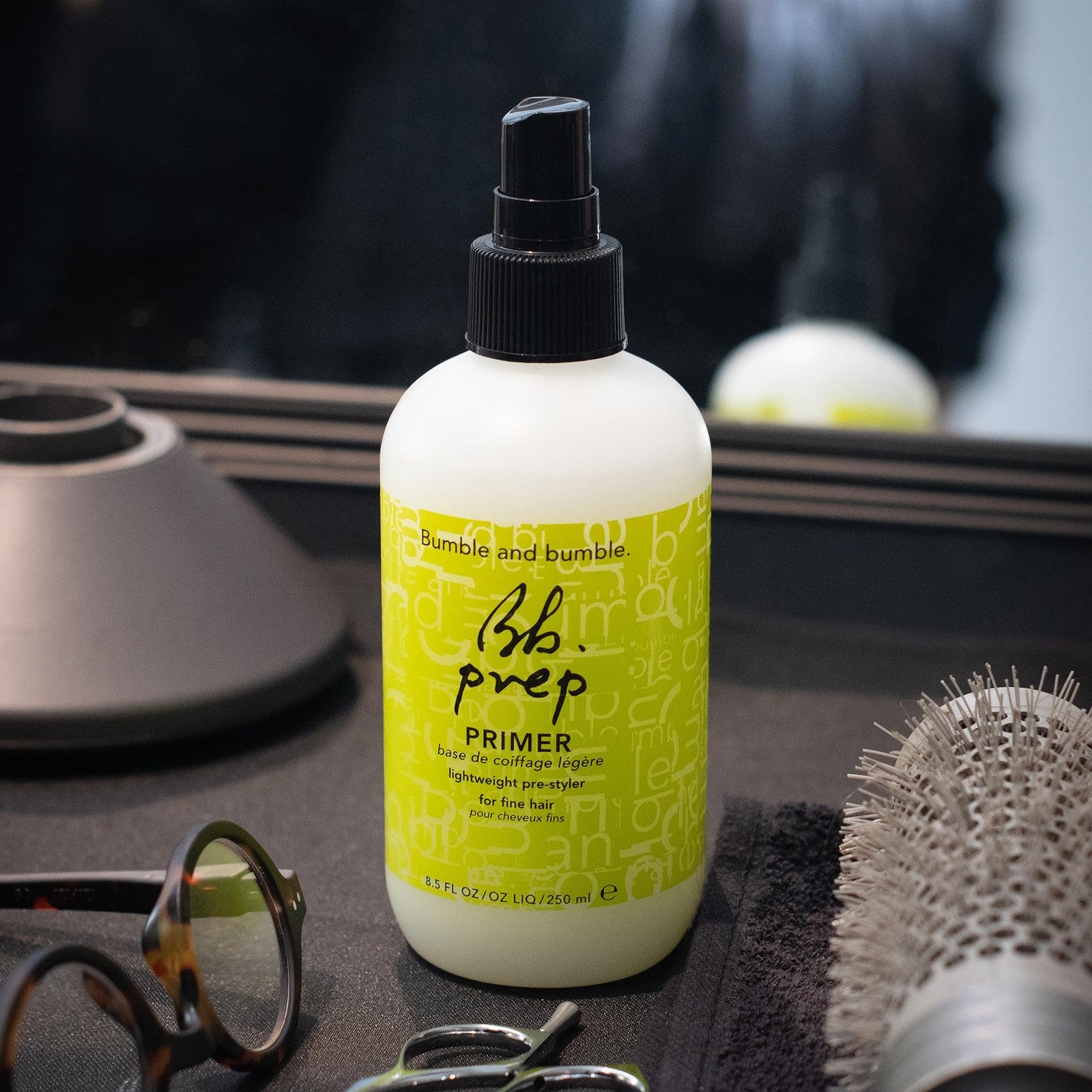 Bumble and bumble Prep Detangling Hair Primer for curly hair, lightweight pre-styler with smooth, shiny finish, close-up view