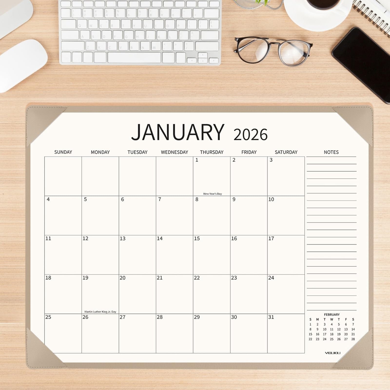 YIBUKIU large desk calendar for 2026-2027, 22x17 inches, showing January to June 2026 with colorful monthly pages.