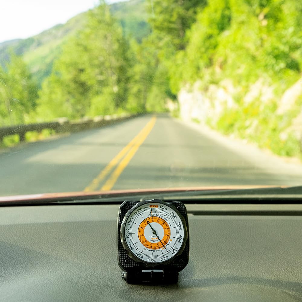 Sun Company Altilinq dashboard altimeter and barometer for car, showing altitude and atmospheric pressure on digital display.