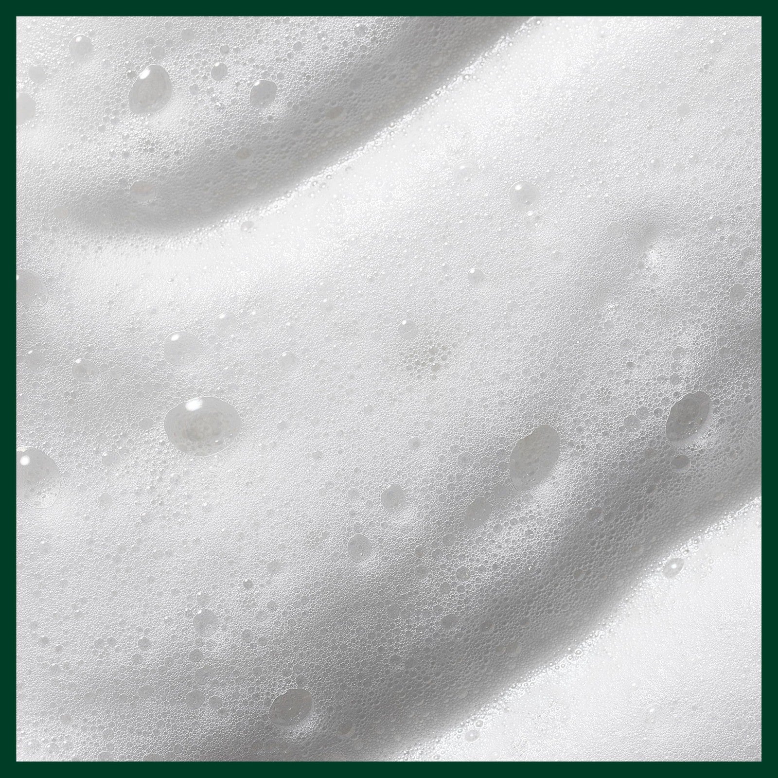 Aveda Nutriplenish Styling Treatment Foam, soft hold styling foam for medium to thick hair, in a white pump bottle.