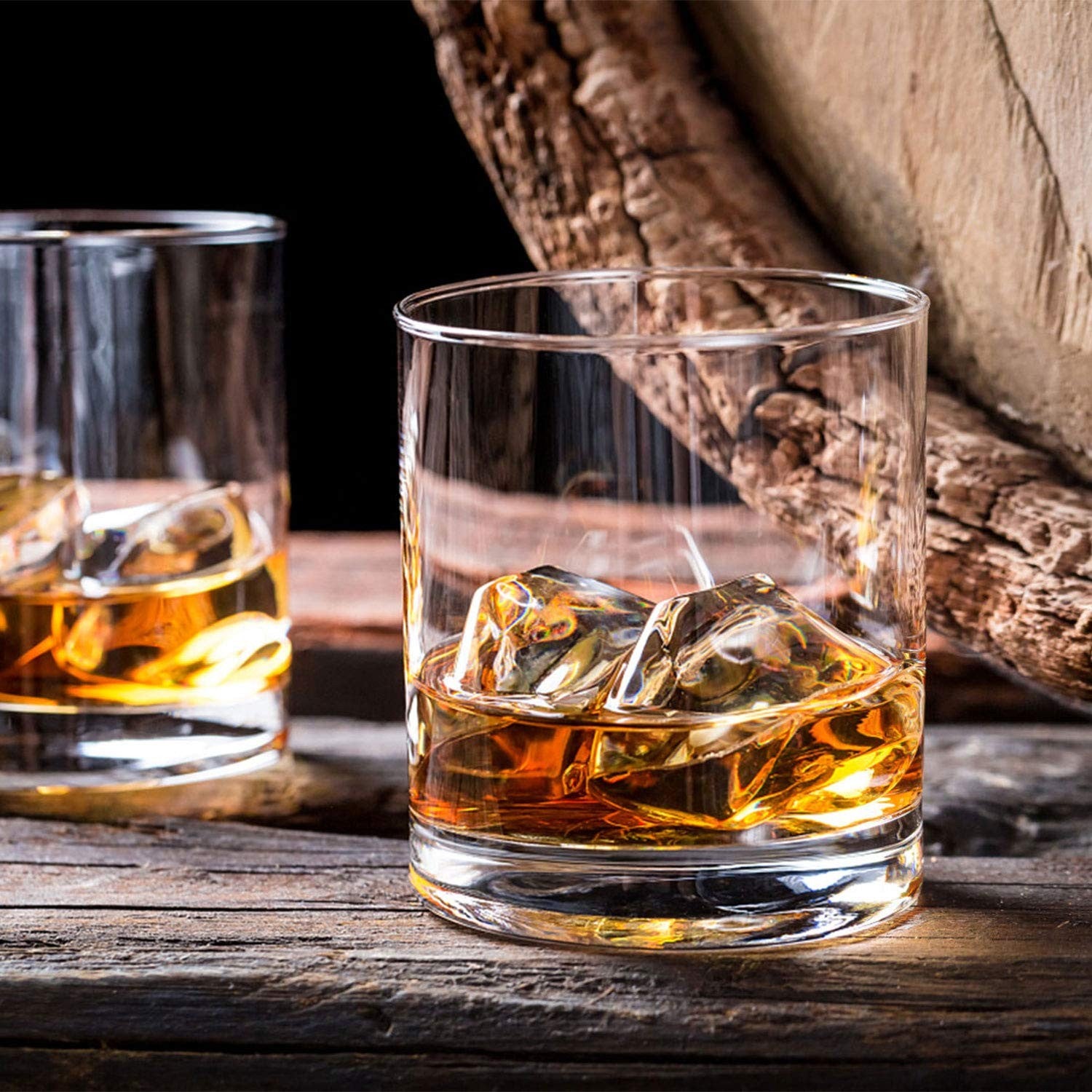 QAPPDA 7oz clear old fashioned cocktail glasses with heavy bases, ideal for drinking and serving beverages.