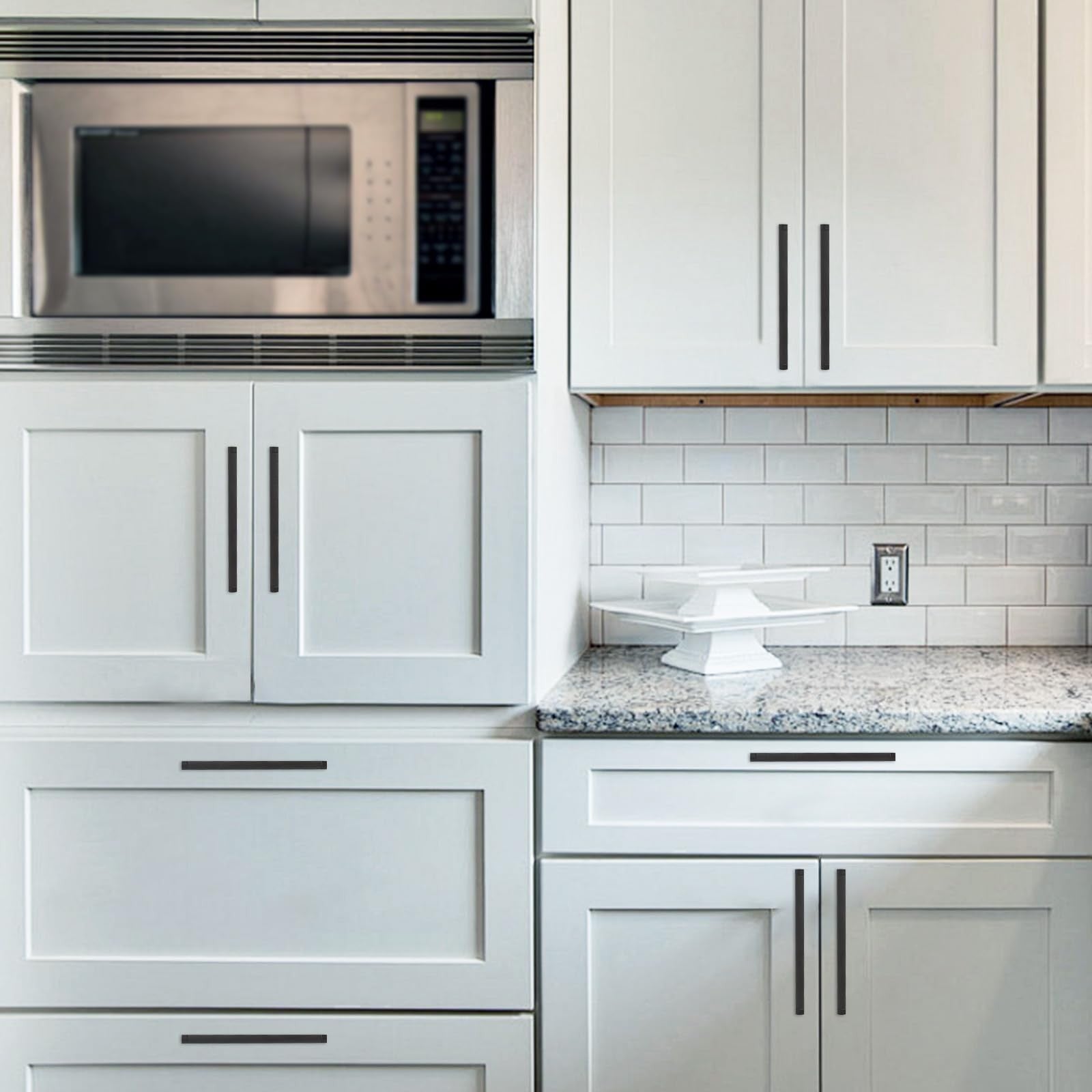 KOMOTIA 6-pack matte black knurled cabinet pulls with 11.3-inch hole center kitchen handles on a cabinet surface.