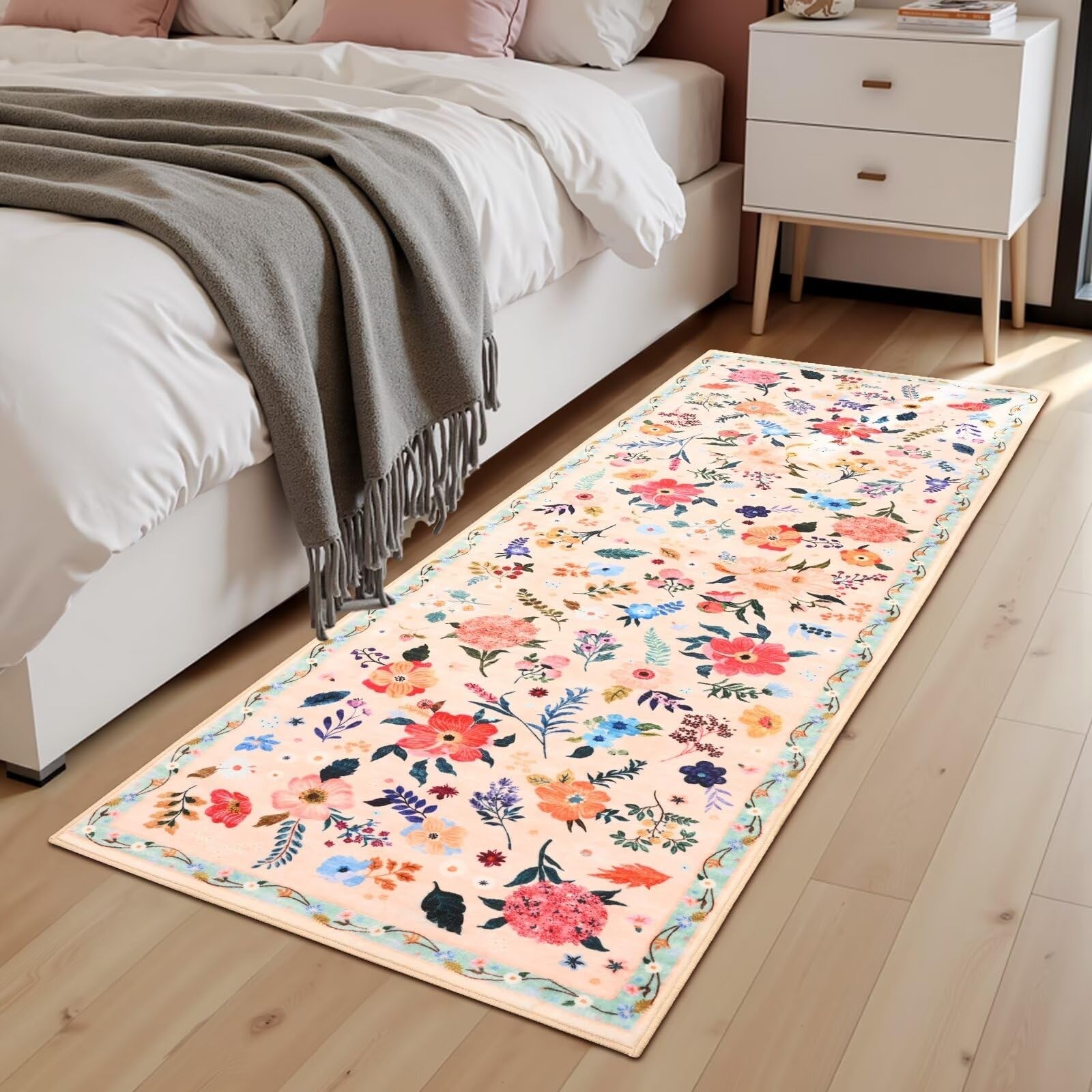 Macgace floral runner rug with washable flowers print and non-slip backing, showcasing vibrant flower designs on a fabric surface.