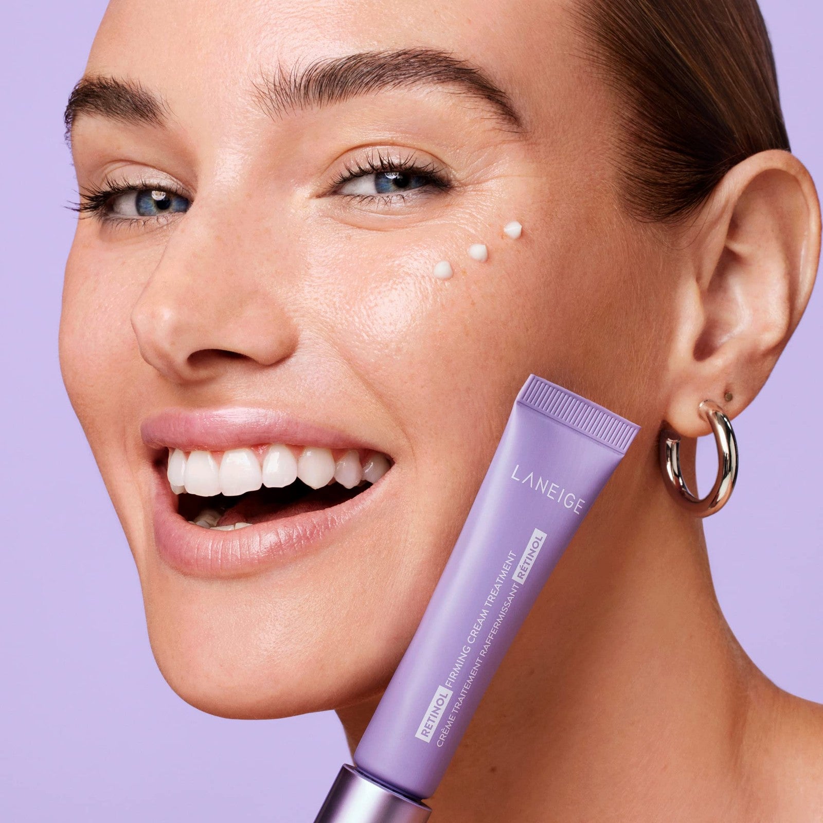 Laneige Retinol Firming Cream Treatment jar showing the anti-aging moisturizer with a smooth, creamy texture and branded packaging.