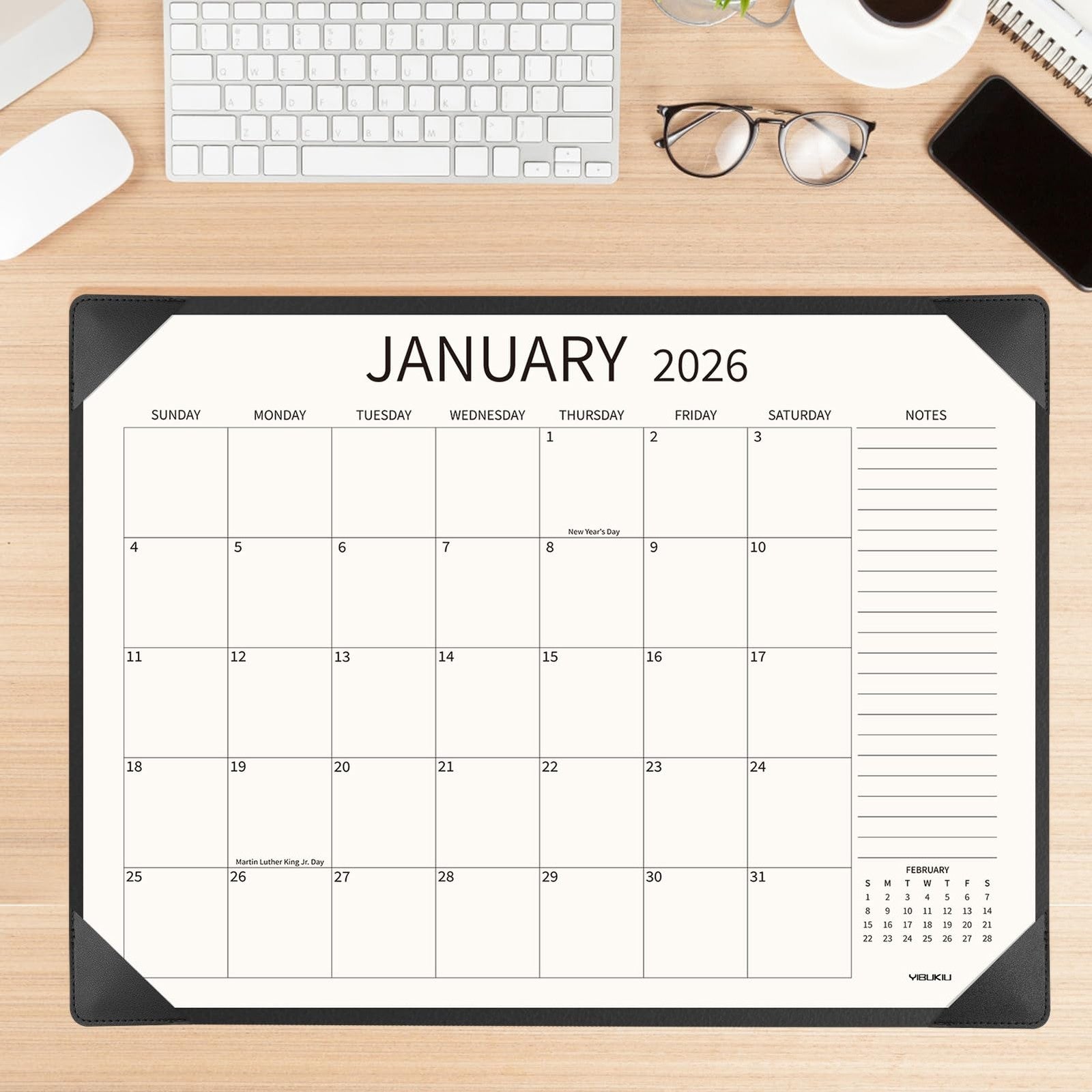 YIBUKIU Yibukiu desk calendar 2026-2027, large 22x17 inches, displaying January 2026 page with monthly grid and design elements.