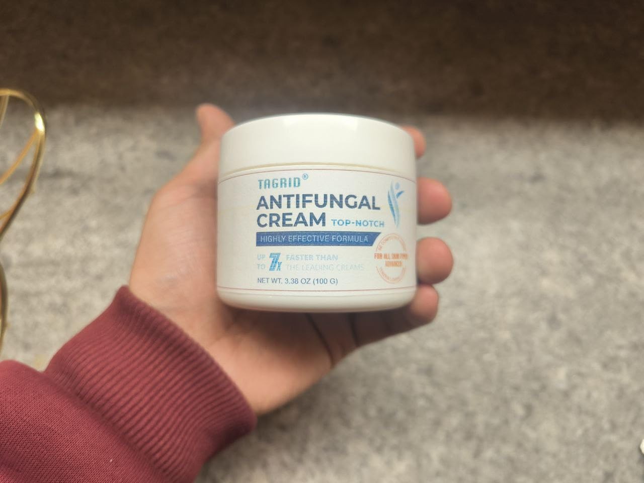 Unbranded Tagrid antifungal cream for jock itch, showing the tube and application on affected skin for athletes and active people.