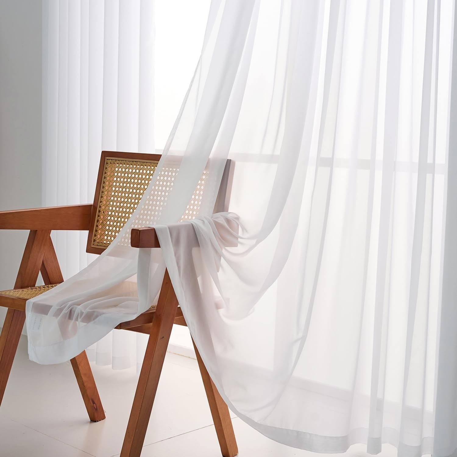 LUGOTAL Pure White 90-inch long chiffon sheer curtains with pinch pleats, perfect for elegant window decor.