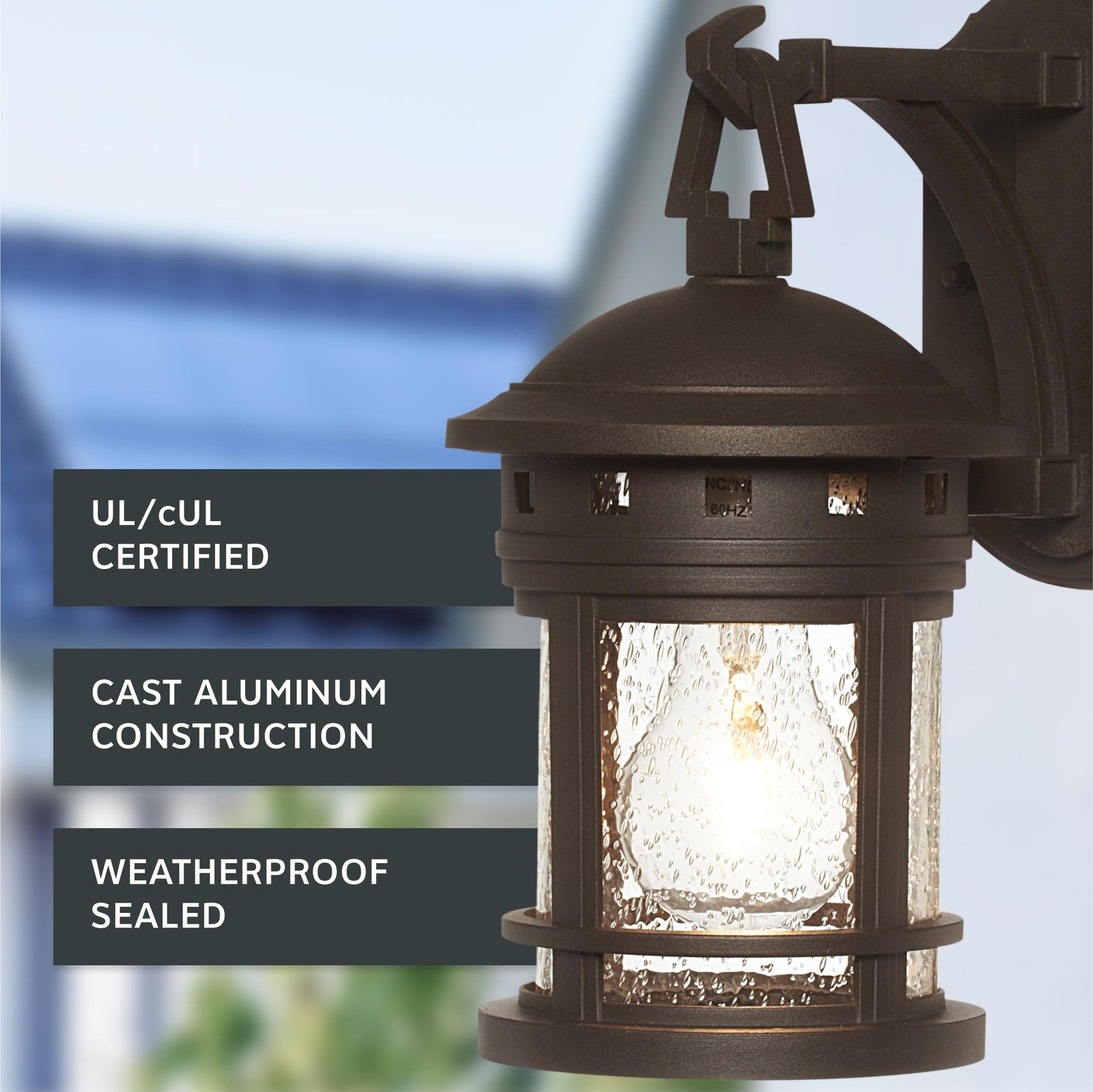 Exterior wall light fixture by Designers Fountain Sedona, 10.75-inch outdoor wall mount with classic design and weather-resistant finish.