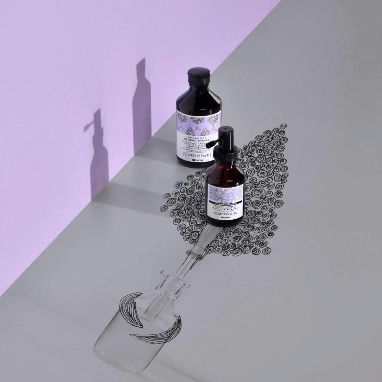 Davines Naturaltech CALMING Shampoo bottle with gentle cleansing formula for sensitive, itchy scalp in a clear, minimalist design