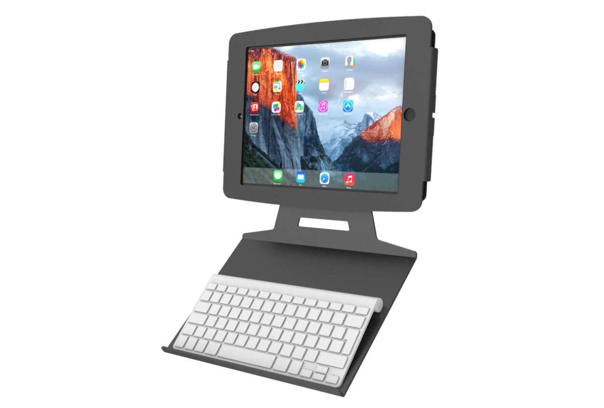 Compulocks UKBTRAYB universal tablet enclosure kiosk with black wall-mounted keyboard tray, designed for secure tablet display.