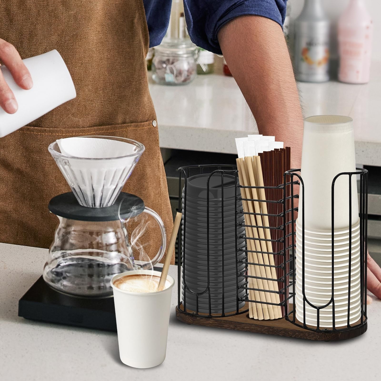 Tanggiteck 3-compartment 18oz coffee cup dispenser rack with wooden base, holding disposable coffee cups.