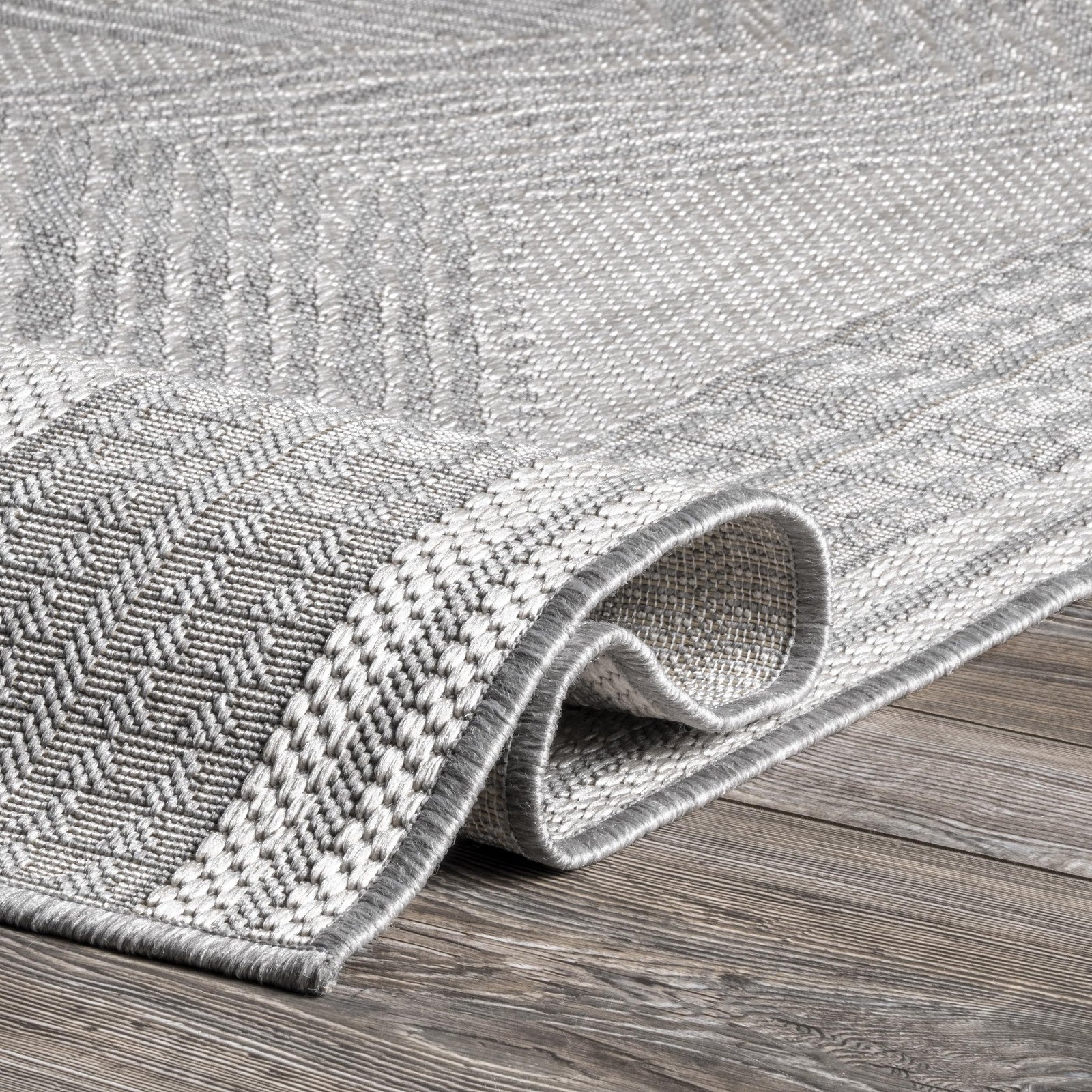 nuLOOM Ranya light grey and ivory tribal geometric runner rug, soft and cozy with a modern high-quality design.