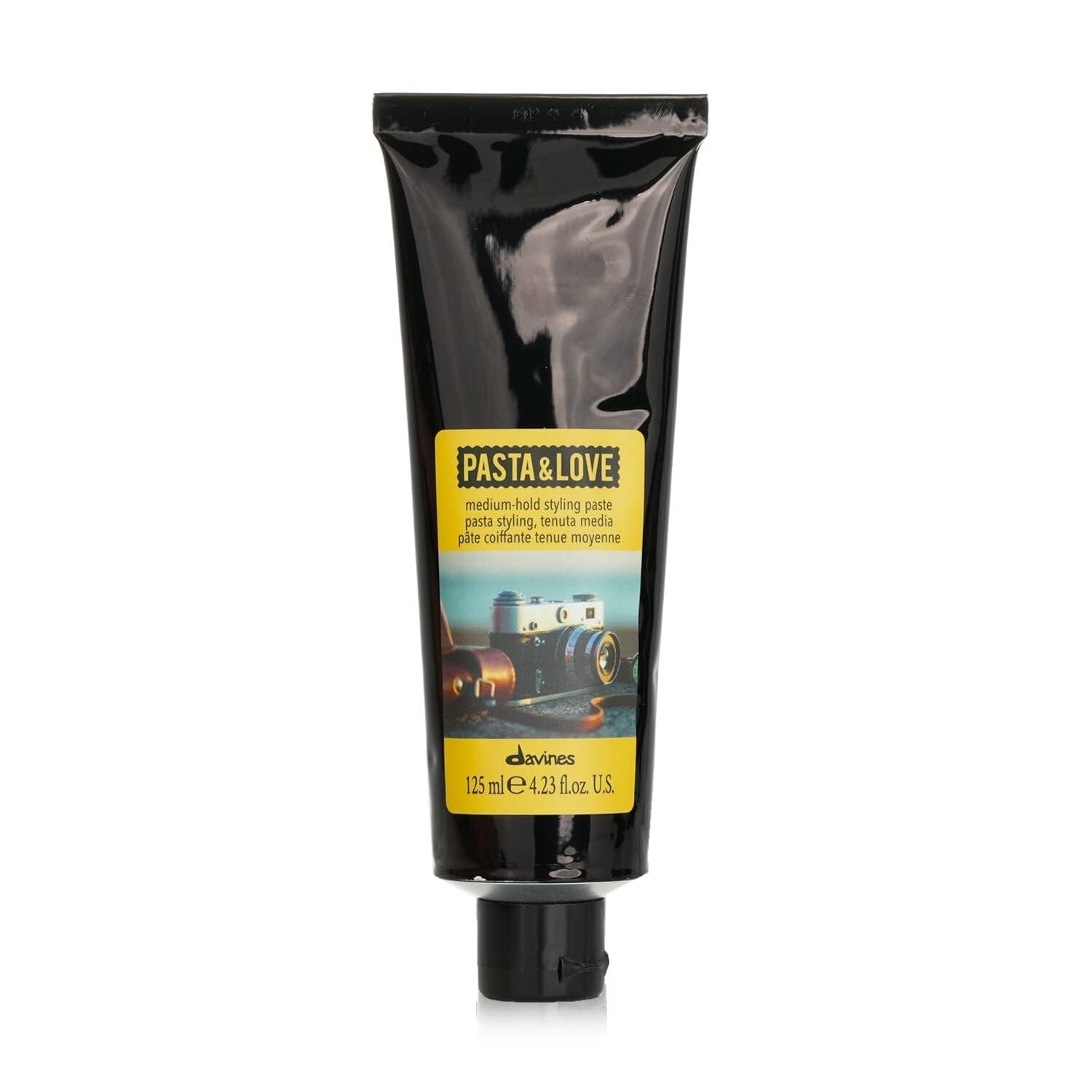 Davines Pasta & Love Medium-Hold Styling Paste in a jar with a natural finish, showcasing its workable hair styling paste texture.