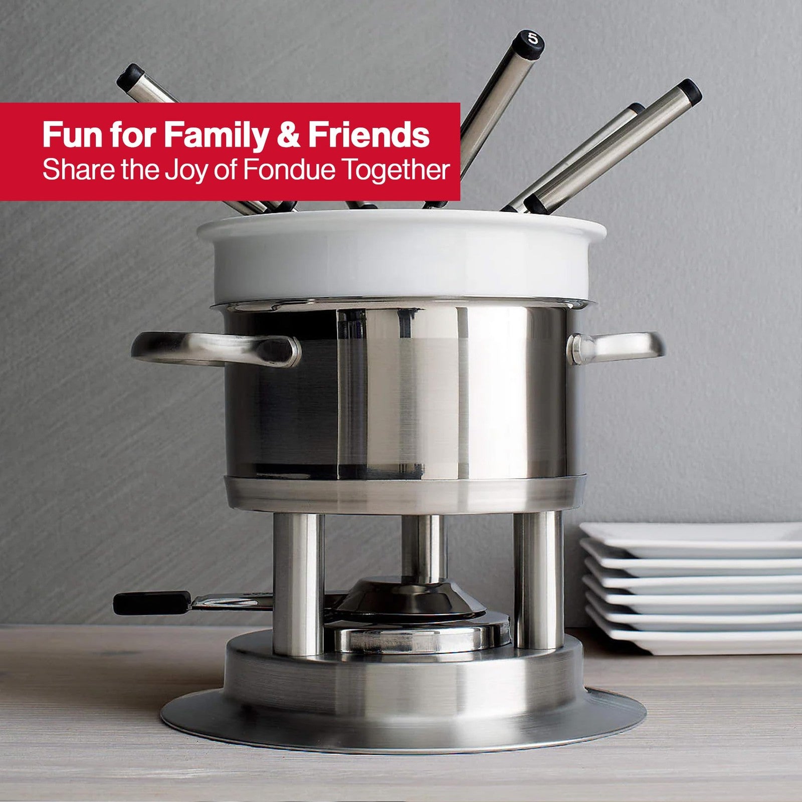 Swissmar Arosa 11-piece stainless steel 3-in-1 fondue set with fondue pot, forks, and stand for cheese, chocolate, and broth fondues.