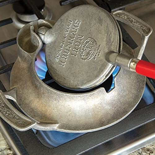 Nordic Ware Norwegian Krumkake and Pizzelle Iron with wooden handles for making traditional Scandinavian cookies and wafers.