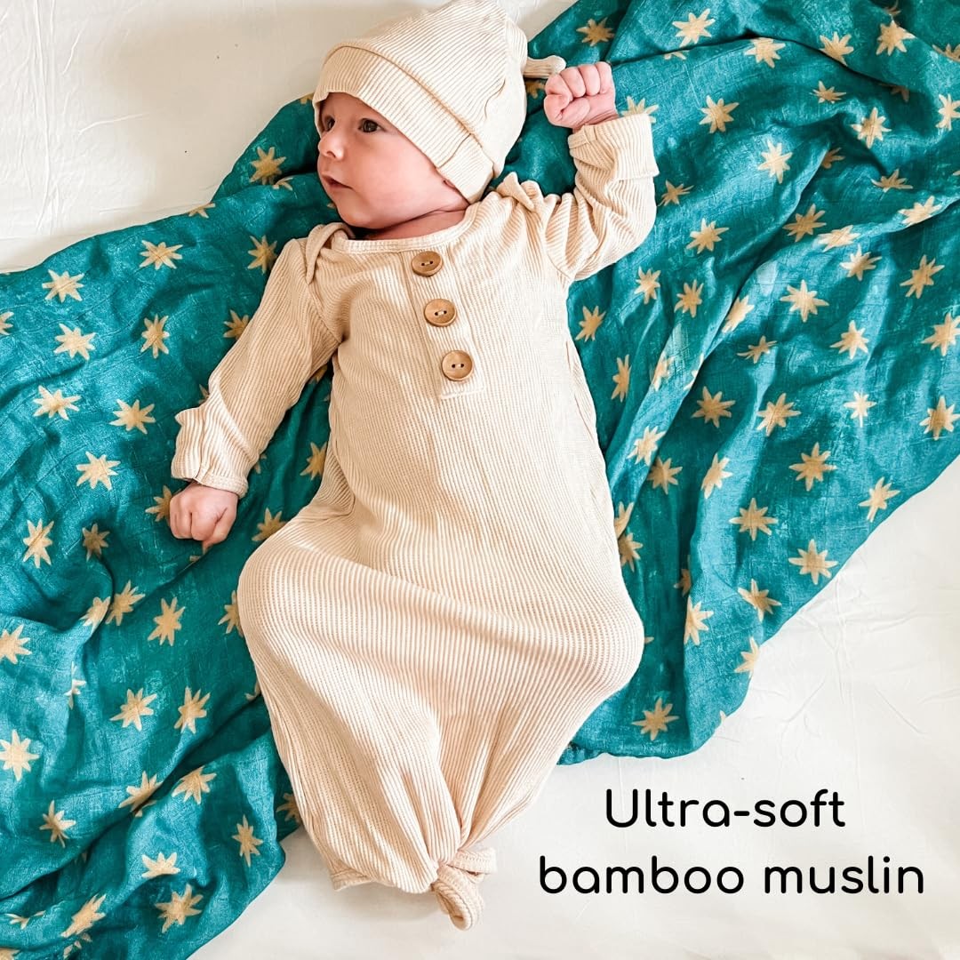 Soft luxury Our Lady of Guadalupe Catholic baby swaddle with Mary's mantle design, 47x47 inches, from The Little Rose Shop.