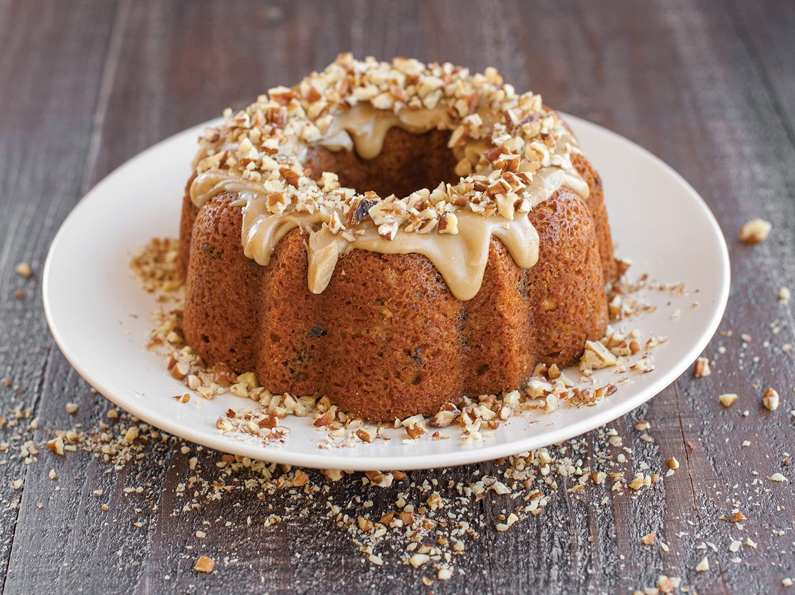 Nordic Ware Platinum Collection 6-cup Bundt pan with intricate fluted design for baking cakes and desserts.