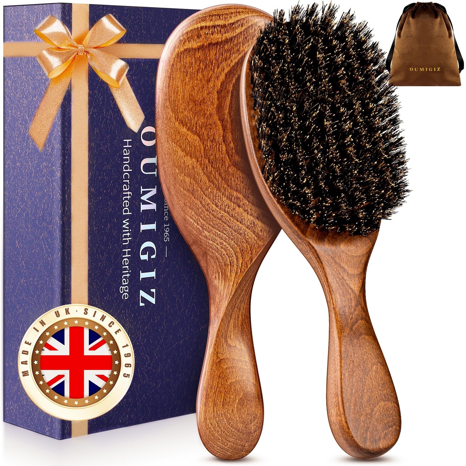 Oumigiz boar bristle hair brush with natural wooden handle, handcrafted since 1965, showcasing traditional British craftsmanship.