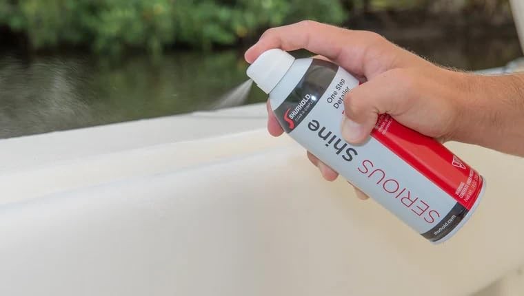 Shurhold Serious Shine Quick Detailer spray polish with UV protection applied to a clean vehicle surface.