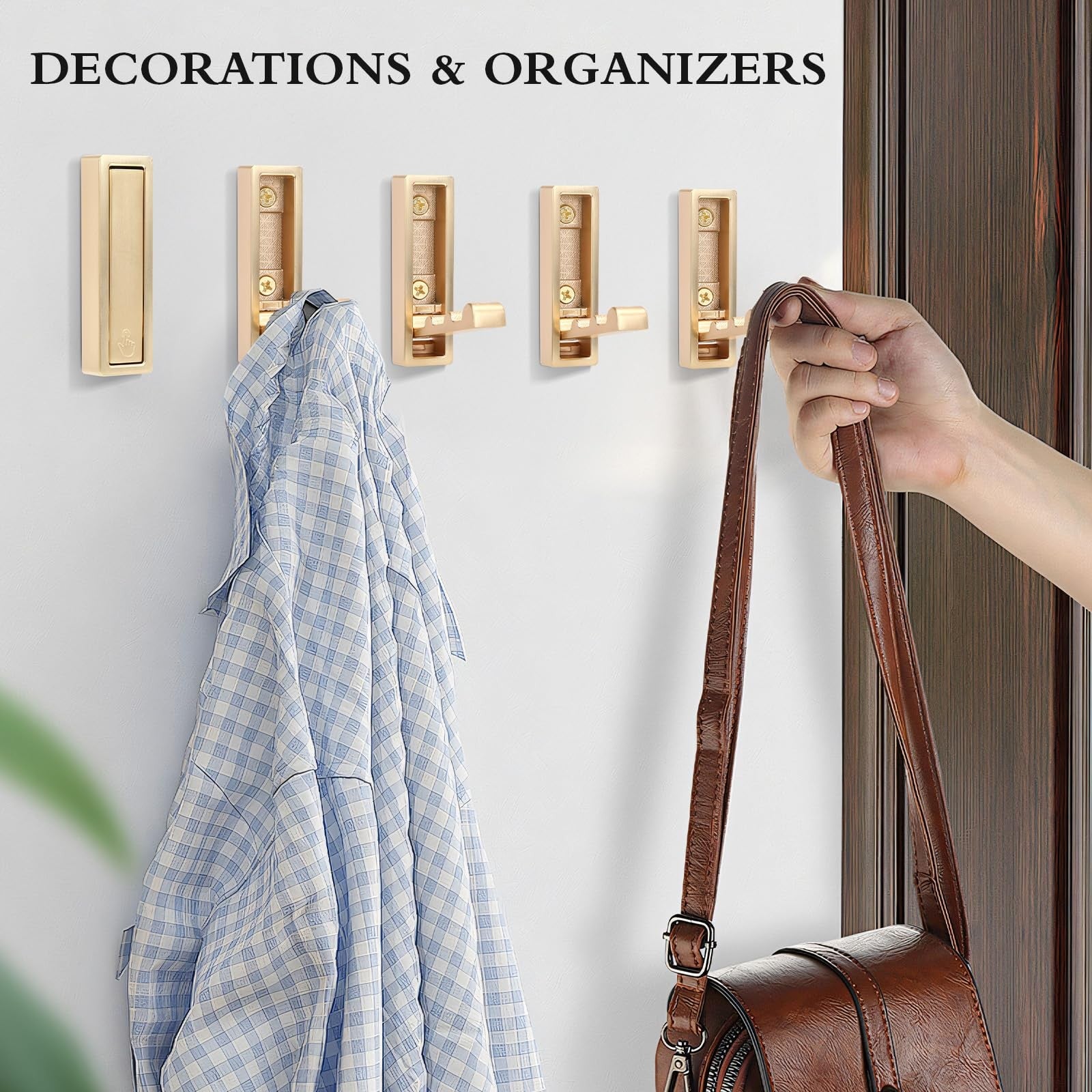 Set of 5 heavy-duty gold zinc alloy folding coat hooks mounted on a wall for coats and scarves.