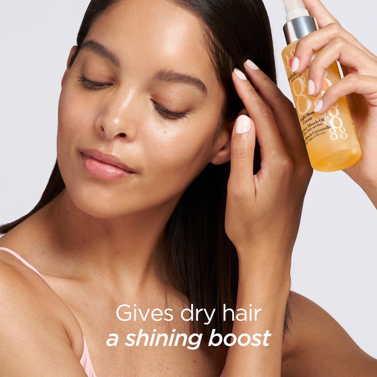 Elizabeth Arden Eight Hour All-Over Miracle Oil bottle showing the 3.4 oz size, designed for face, body, and hair hydration.
