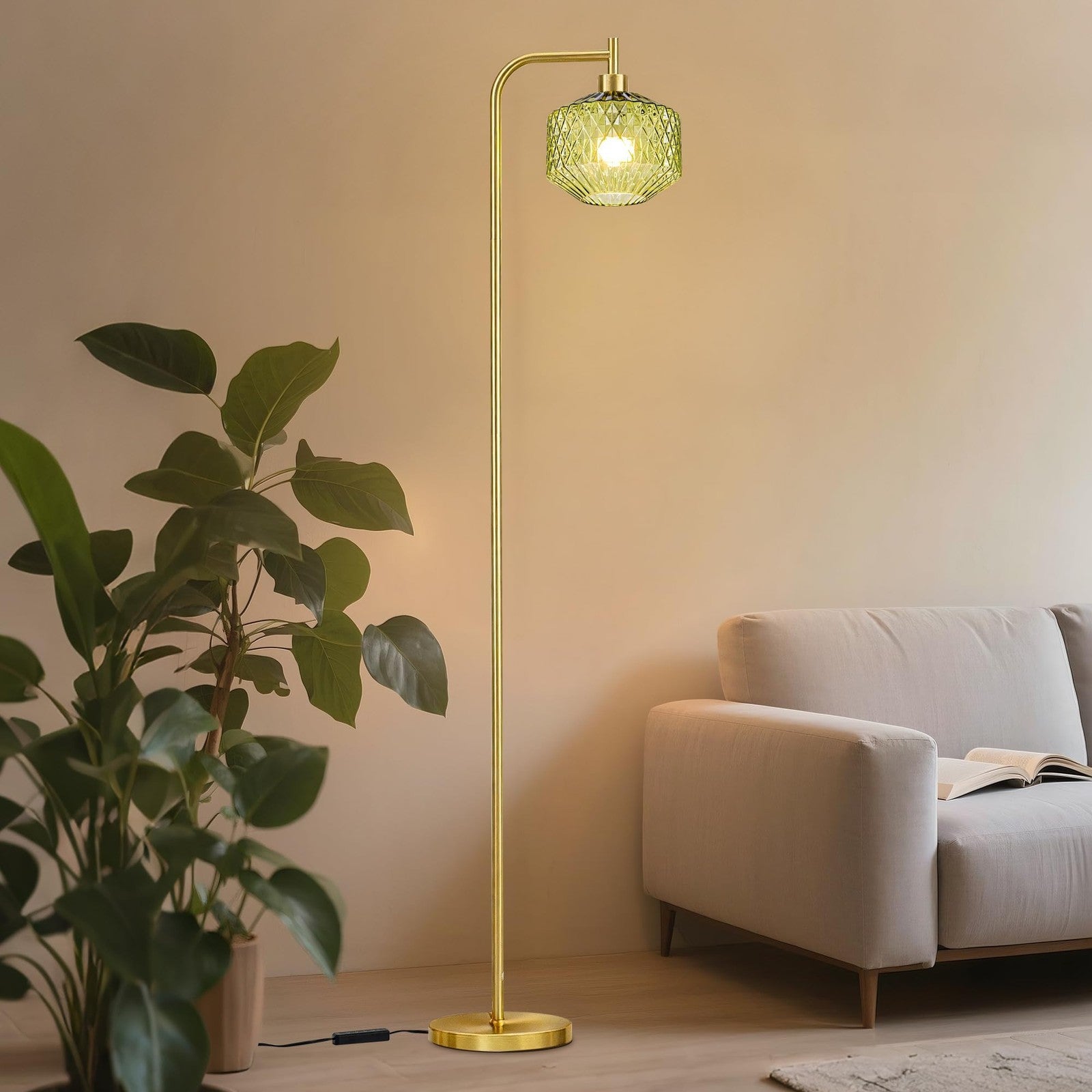 Emerald green ribbed glass Mayna mid-century modern floor lamp standing with a sleek metal base and tall cylindrical design