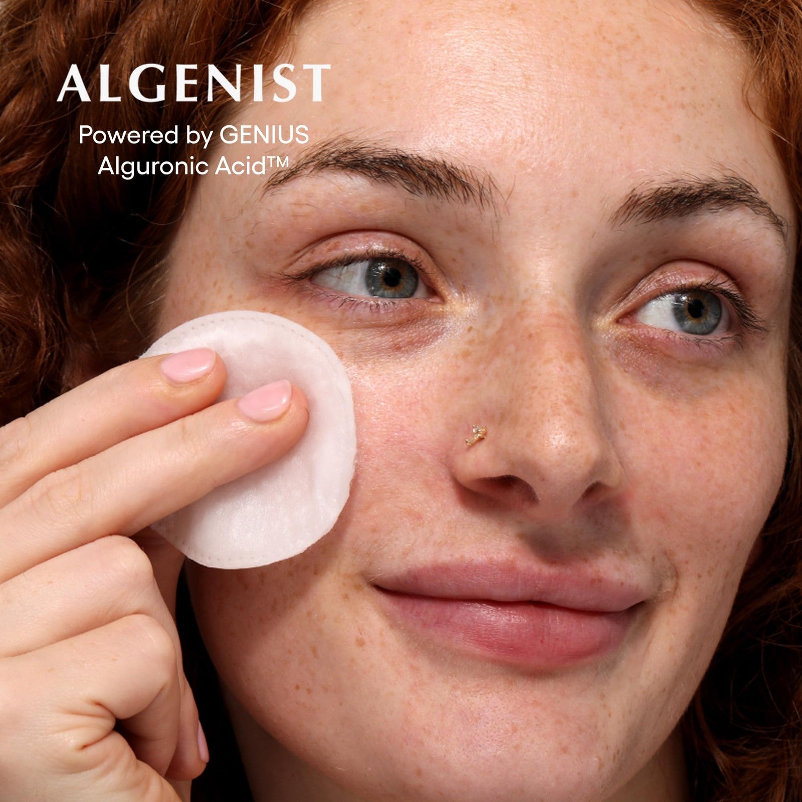 Algenist Genius Liquid Skin Resurfacing Face Toner with 2% BHA, clear liquid exfoliant for smooth, refreshed skin.