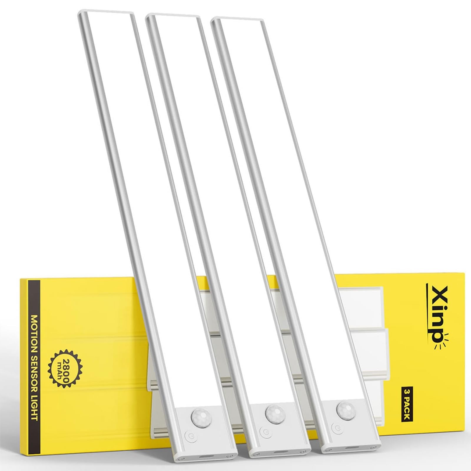 Xinp LED magnetic motion-activated under cabinet lighting installed under kitchen cabinets, showing sleek design and magnetic mounts.