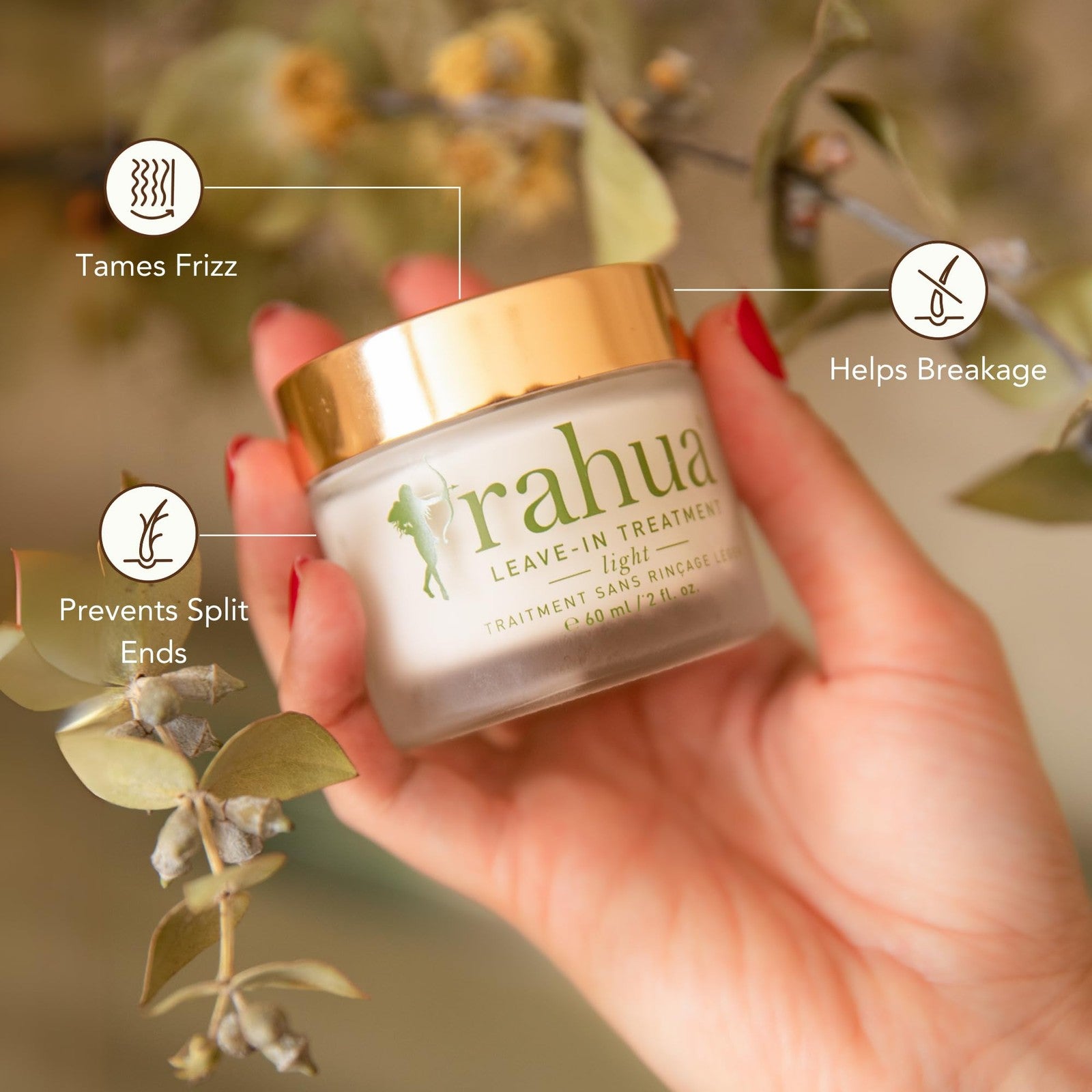 Rahua Light Leave-In Treatment and Vegan Heat Protectant spray for hair, showing the bottle and spray nozzle.