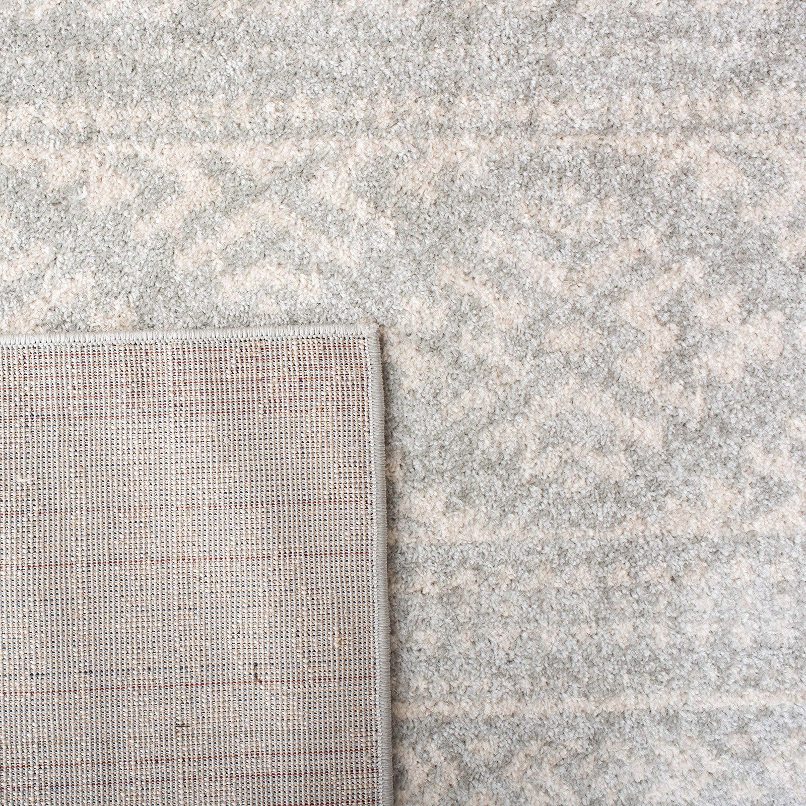 Light grey and ivory Safavieh Tulum Collection accent rug with Moroccan boho pattern, measuring 2x5 feet.