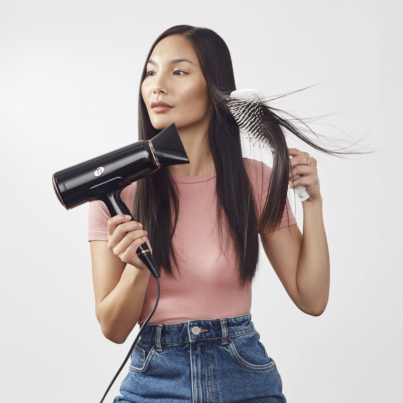 T3 Smooth Paddle Brush with cushioned body and wide flat base for gentle styling, ideal for smooth, salon-quality hair.