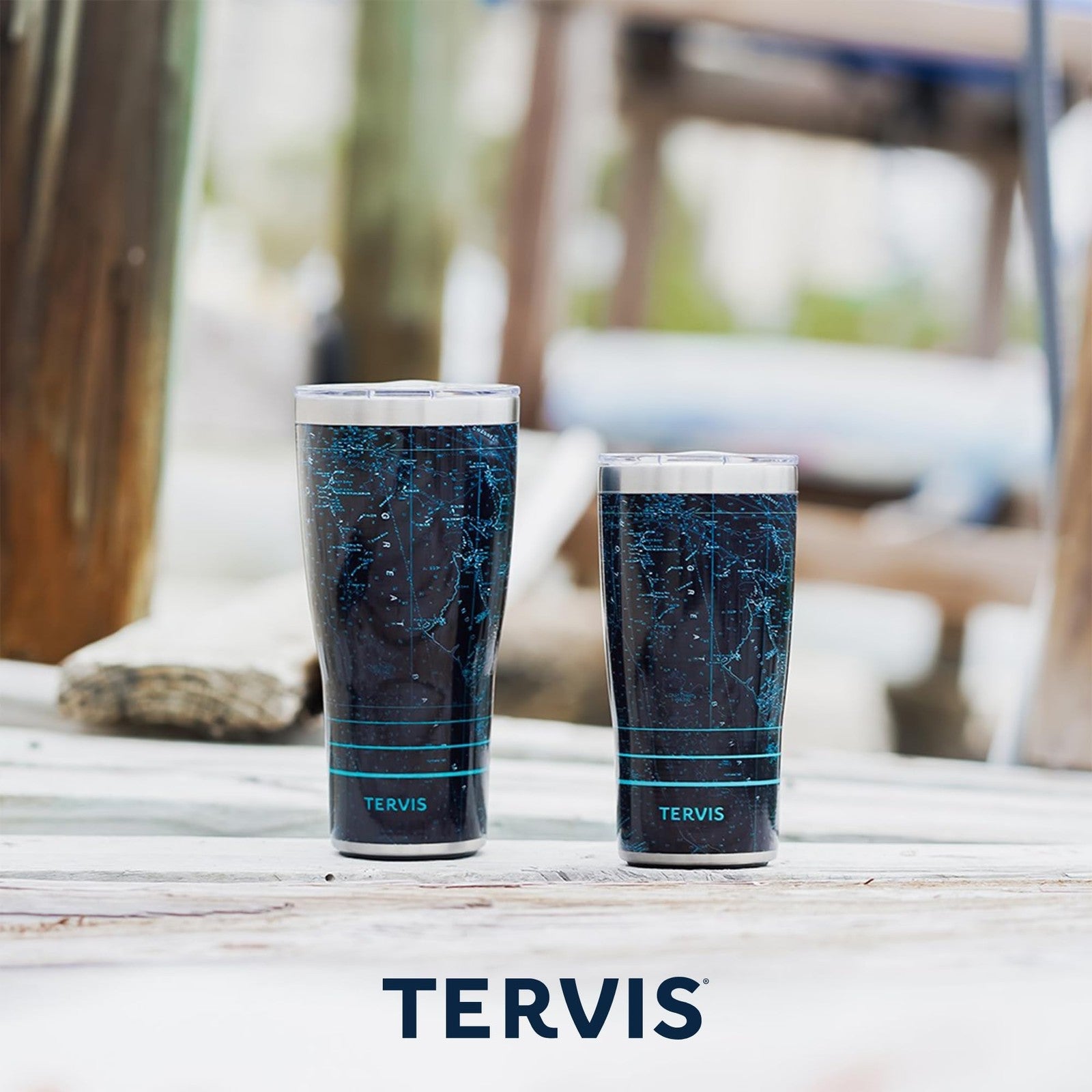 Tervis Traveler Wicked For Good gold triple insulated tumbler travel cup with lid and handle, designed for hot and cold beverages.