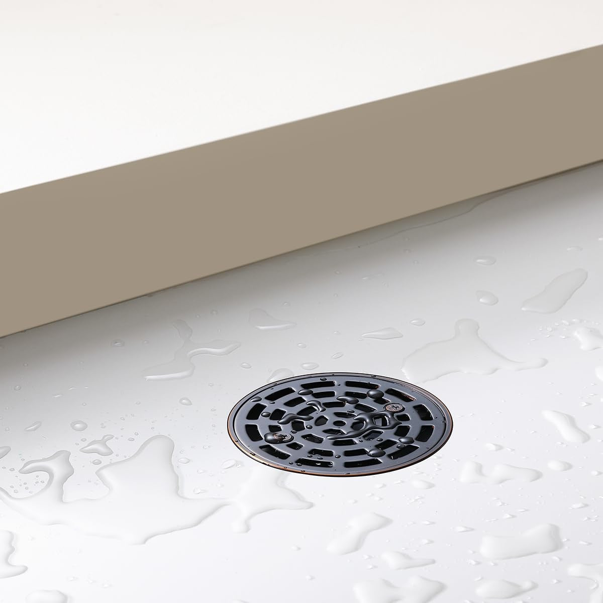 Round shower drain made of SUS304 stainless steel with oil rubbed bronze finish, featuring a sleek and durable design.