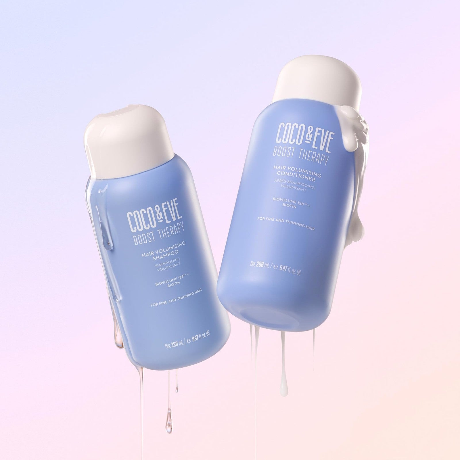 Coco & Eve Boost Therapy volumizing shampoo and conditioner bundle with bottles featuring white and blue labels and pump dispensers.