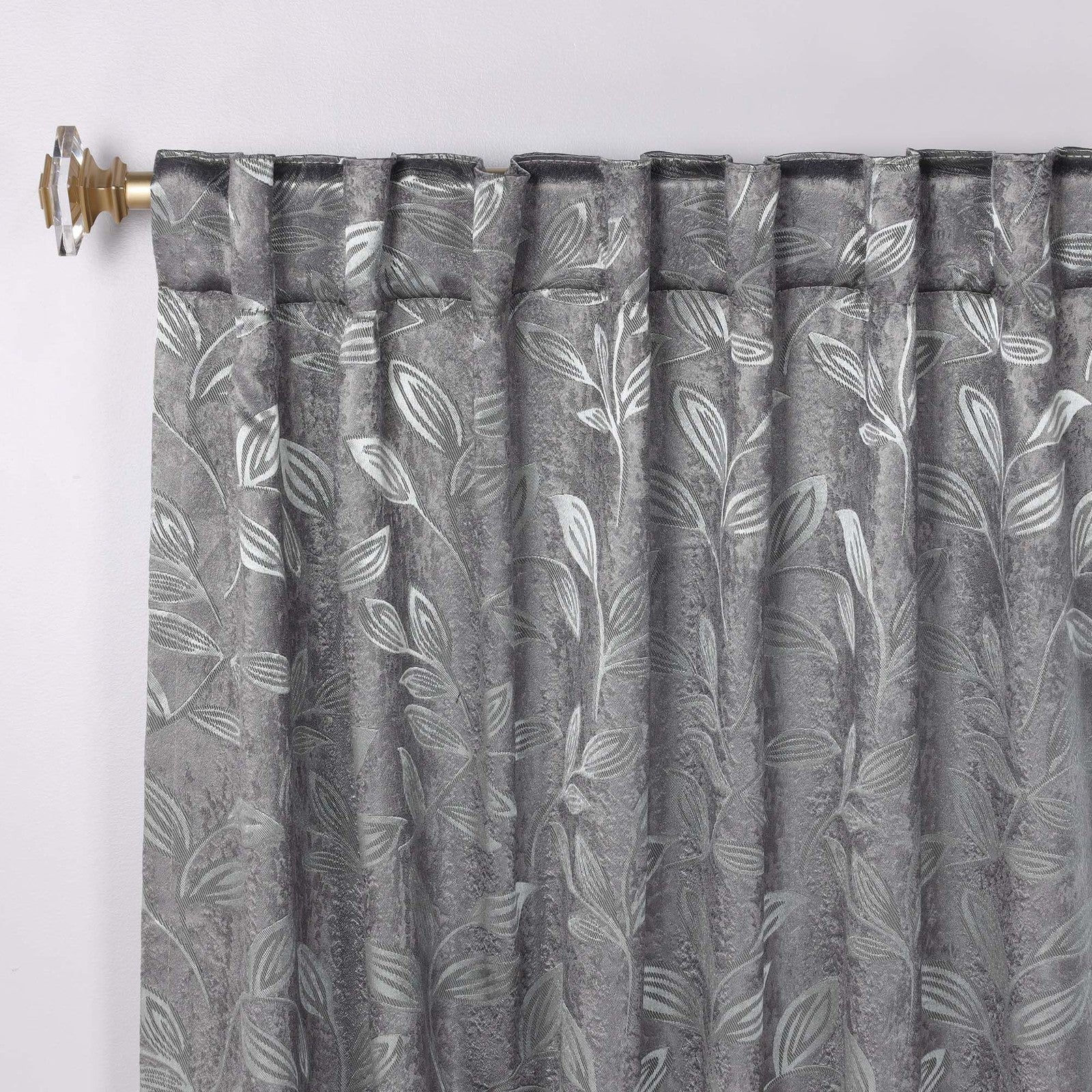 Superior Blackout Curtains in black fabric, room darkening drapes hanging in a bedroom setting with window blinds.