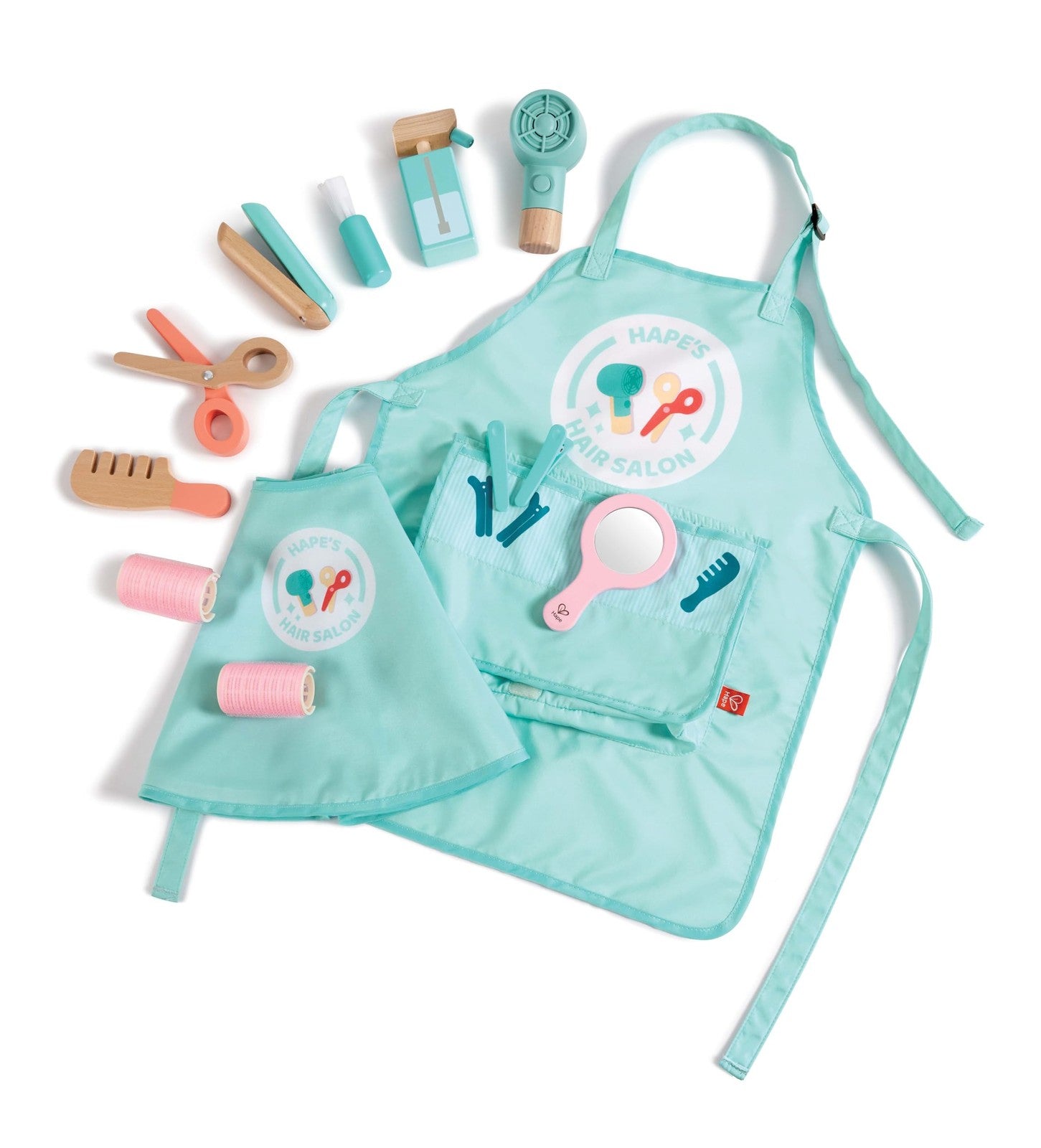 Hape Super Stylish Hair Salon Set for kids with toy hairdryer, scissors, brushes, and styling accessories on a play table.