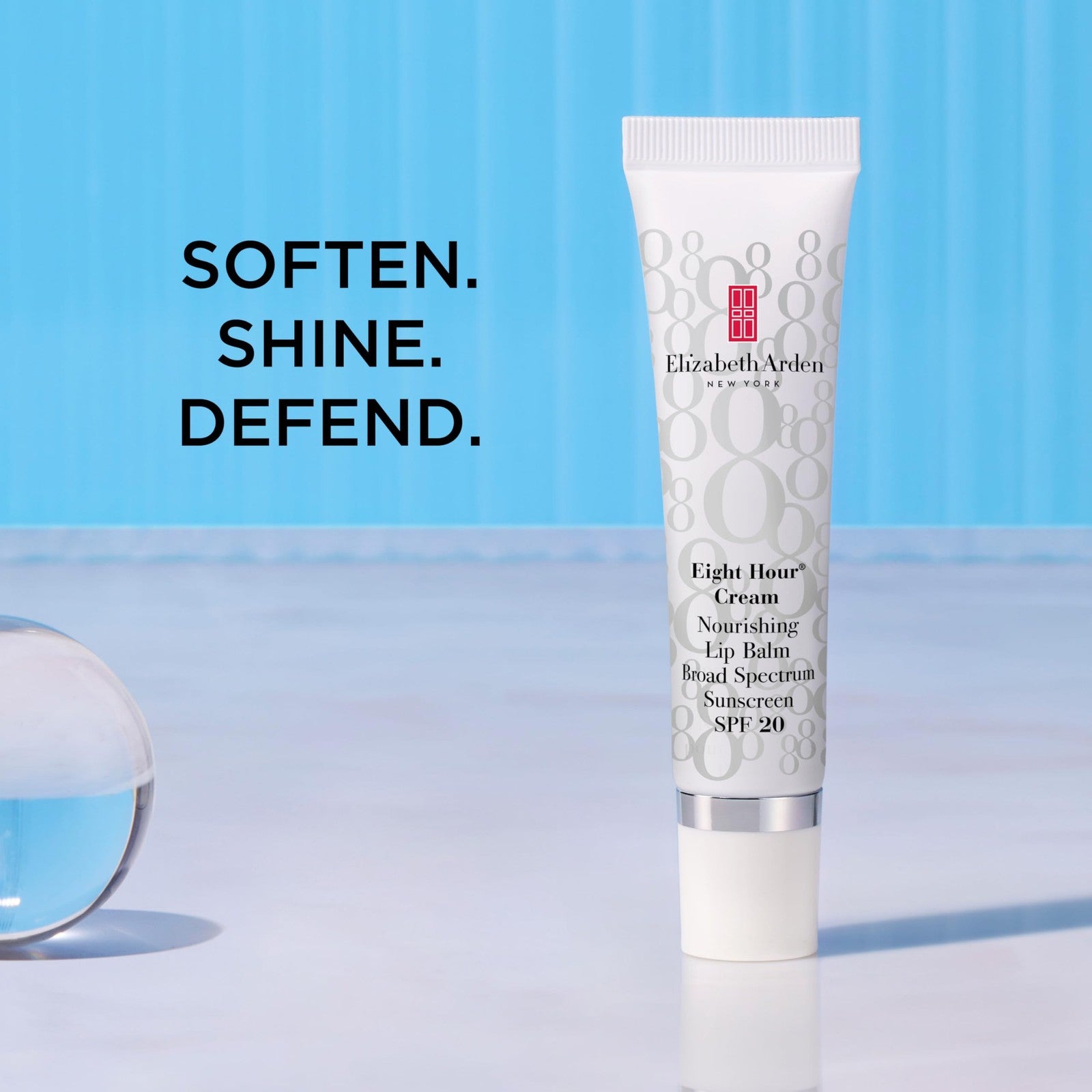 Elizabeth Arden Eight Hour Cream Nourishing Lip Balm with SPF 20, featuring a sleek tube and smooth balm for dry lips.