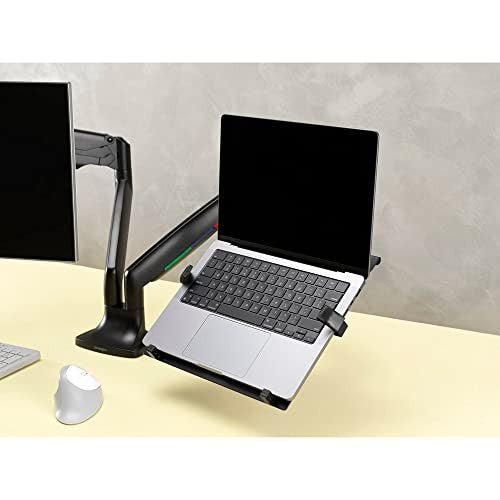Kensington laptop holder designed for VESA-mount monitor arms, shown attached to a desk for ergonomic laptop support.