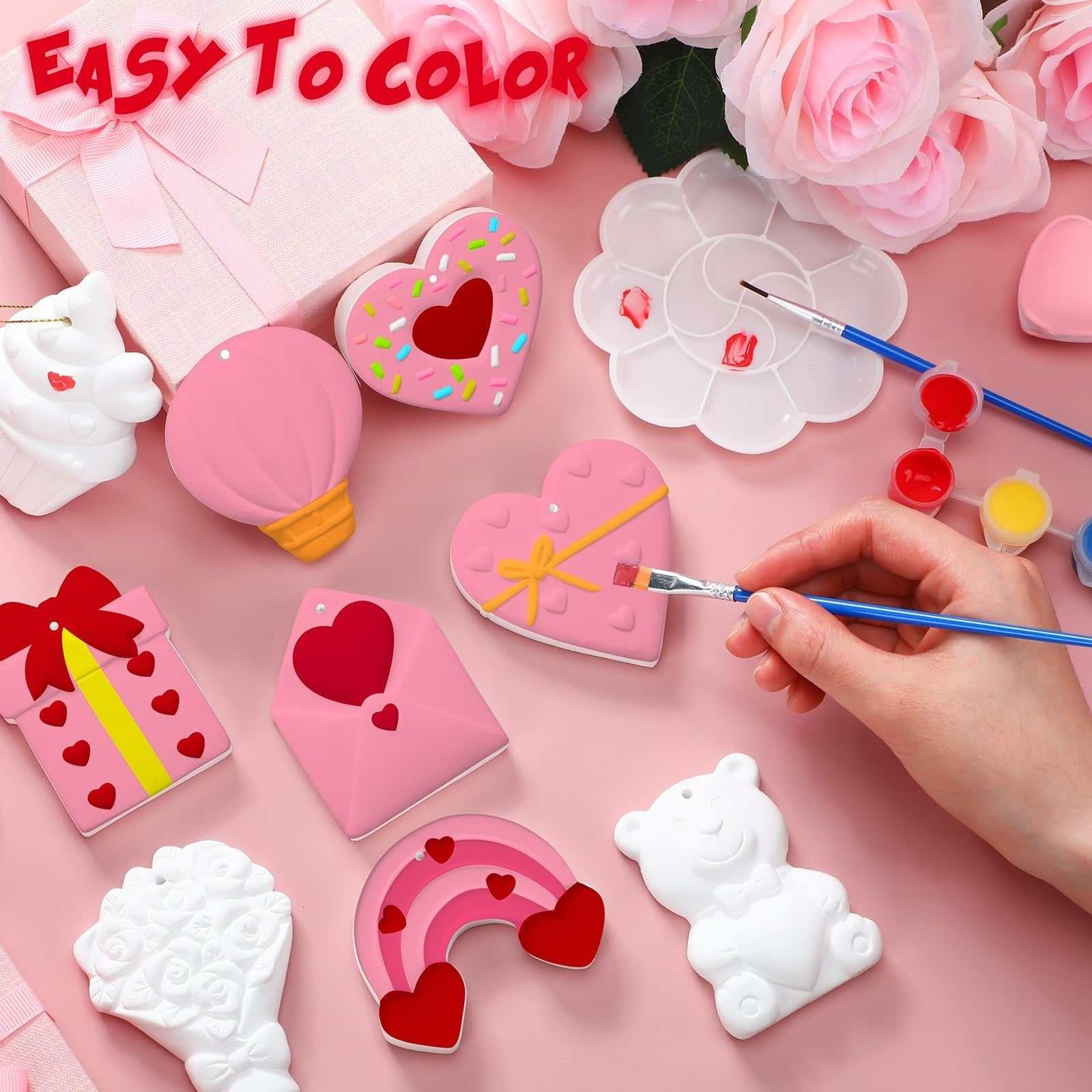 24-piece Valentine's Day ceramic painting kit with figurines, brushes, palettes, and acrylic paints for DIY crafts