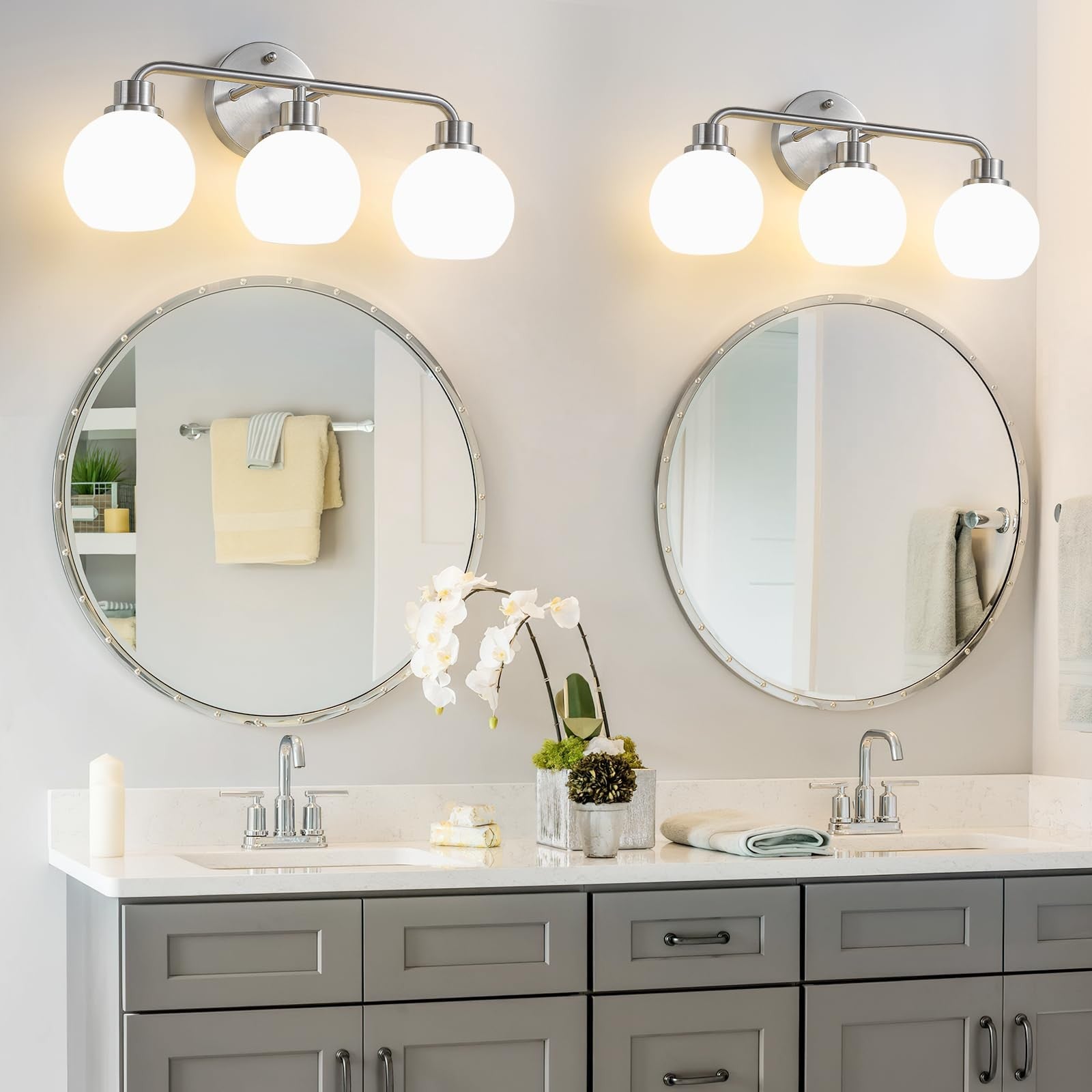 Watyo brushed nickel bathroom light fixtures with three wall sconce lights, ideal for vanity or bathroom wall lighting.