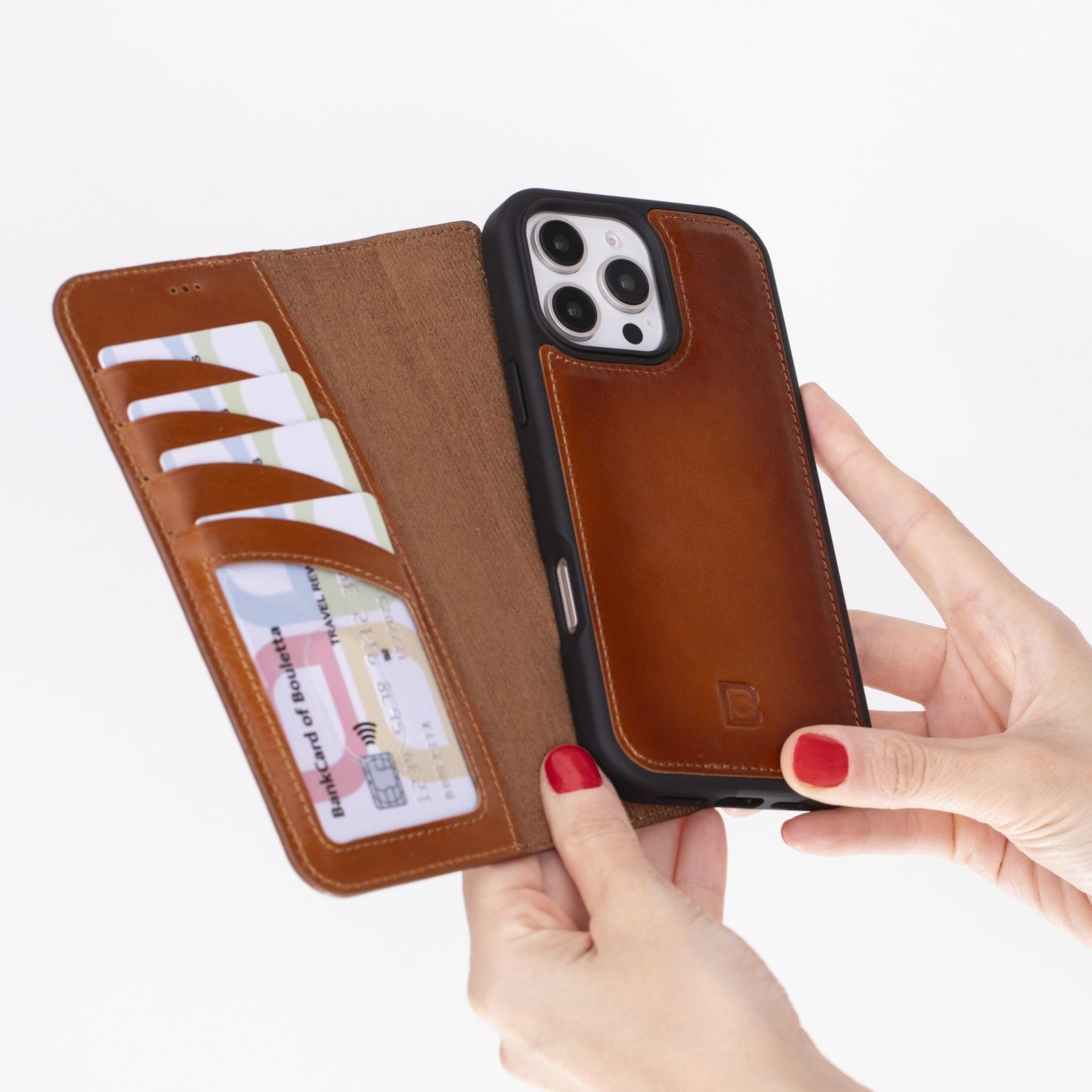 Boulet­ta iPhone 16 Pro case wallet with MagSafe, kickstand, and impact-resistant design, shown in black with card slots.