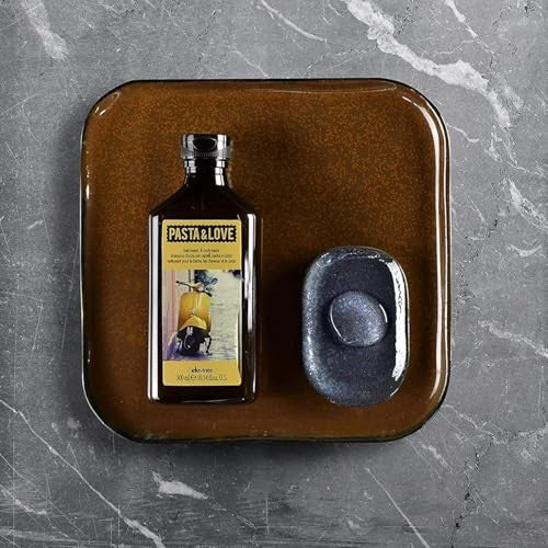 Davines Pasta & Love 3-in-1 hydrating hair, beard, and body wash in a sleek bottle, gentle cleanser for hair, skin, and beard.