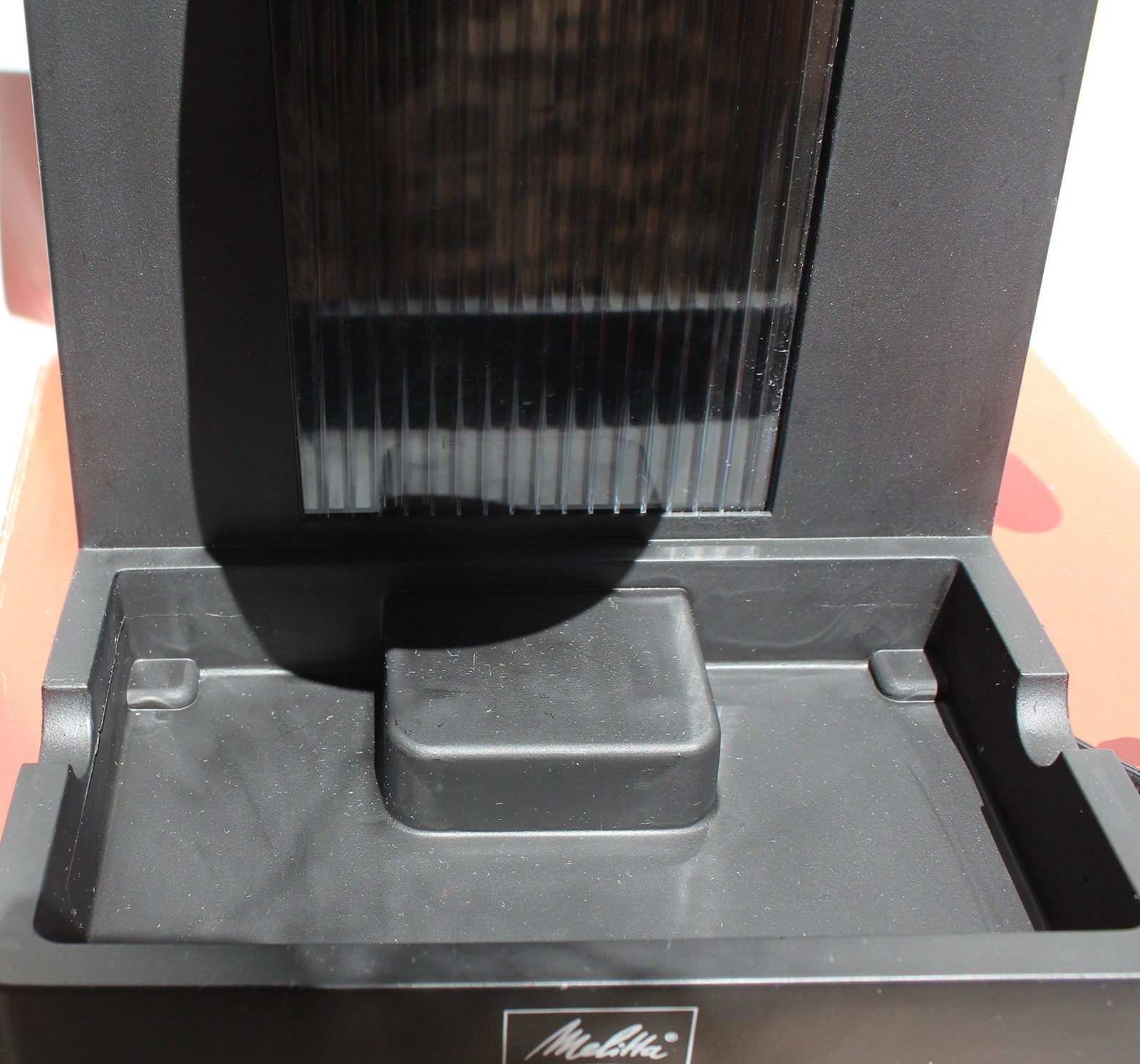 Melitta MEX1B espresso and cappuccino machine with stainless steel finish and brewing controls.
